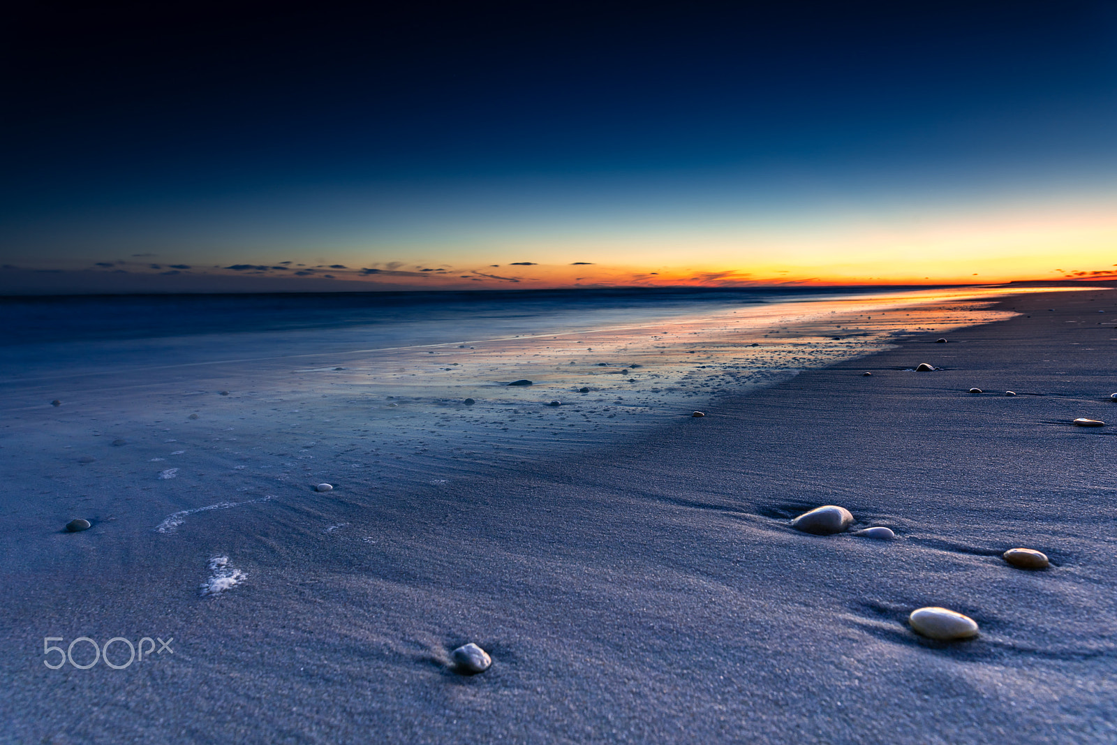 Sony a7R II + Sigma 20mm F1.4 DG HSM Art sample photo. A couple pebbles on the beach photography