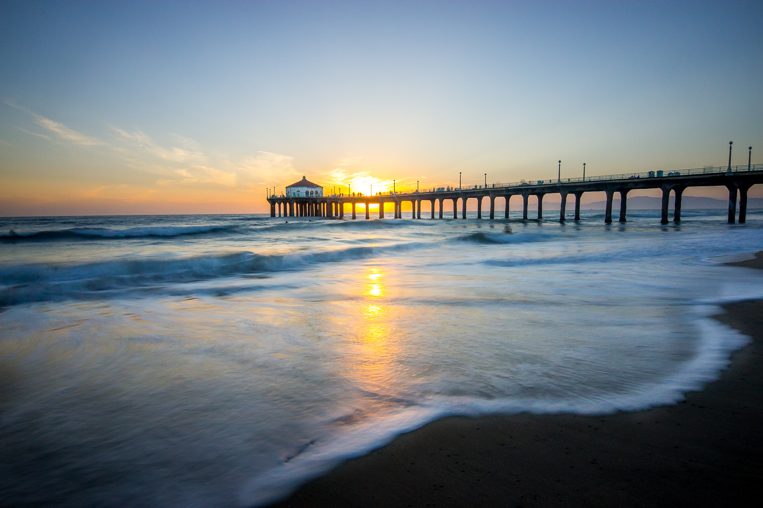 Canon EOS 70D + Tokina AT-X 12-28mm F4 Pro DX sample photo. Sunset and piers photography