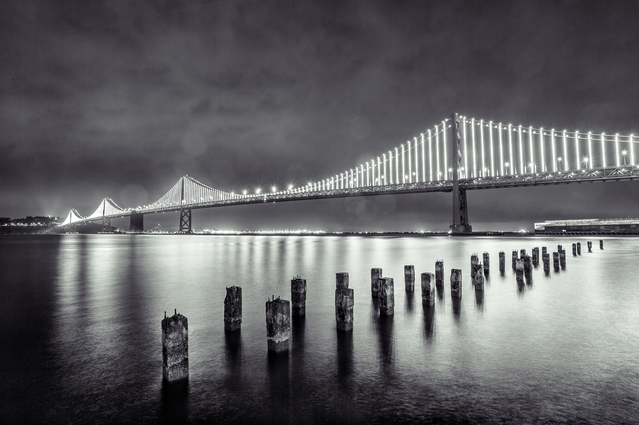 Nikon AF-S Nikkor 18-35mm F3.5-4.5G ED sample photo. Bay bridge illuminations b/w photography