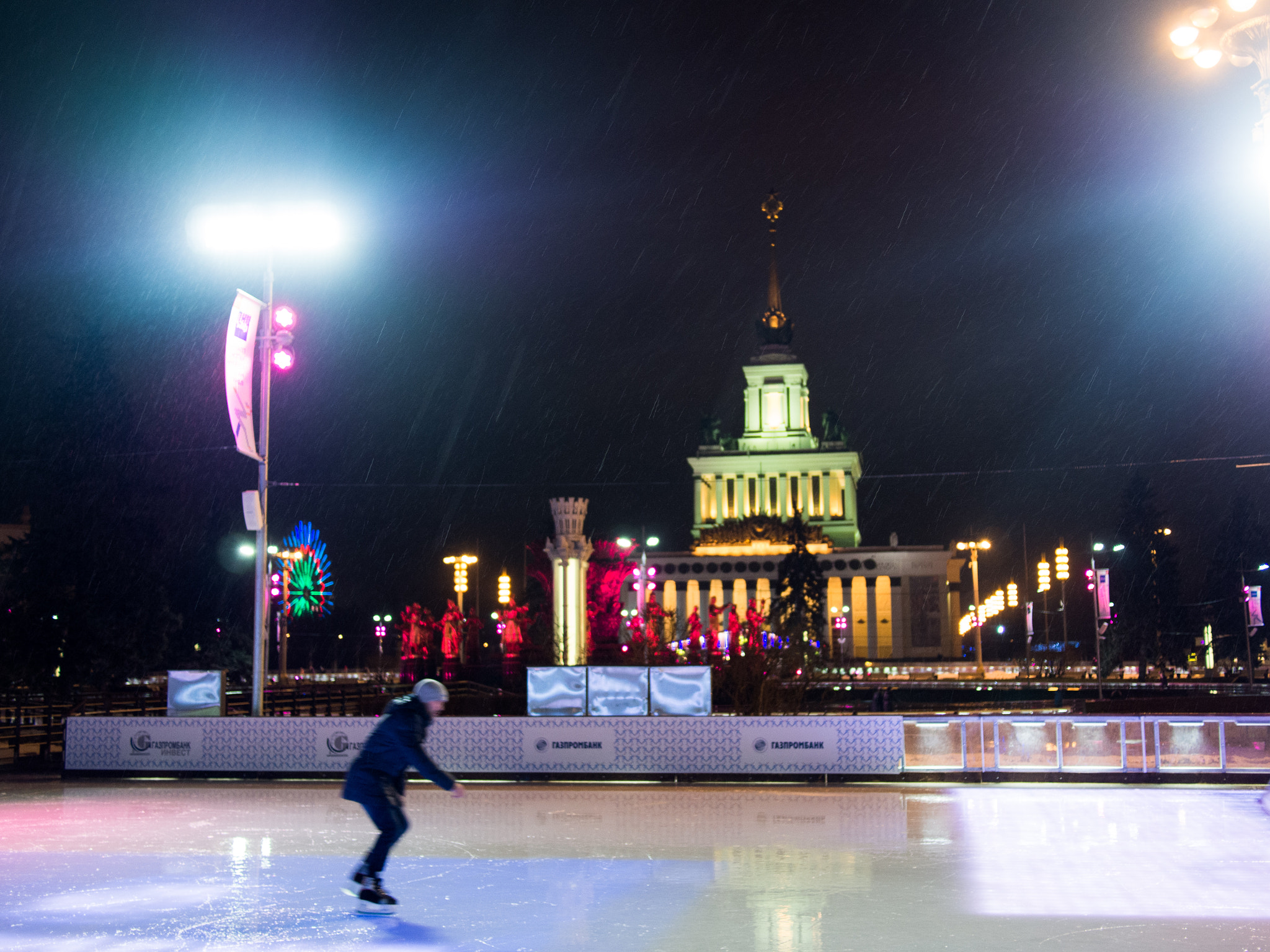 Olympus PEN E-PM2 + Panasonic Lumix G 20mm F1.7 ASPH sample photo. Rainy skating rink photography