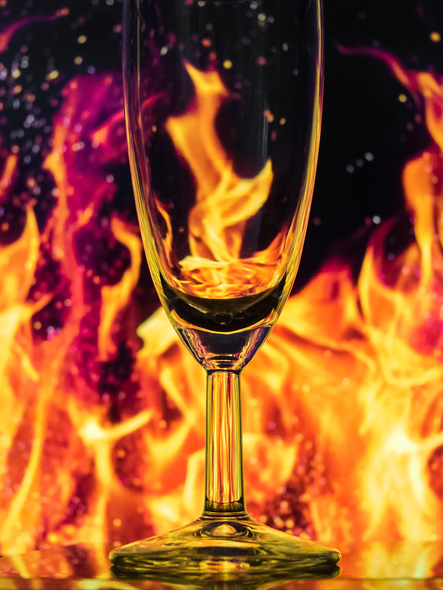 Nikon 1 Nikkor 11-27.5mm F3.5-5.6 sample photo. Wineglass in fire photography