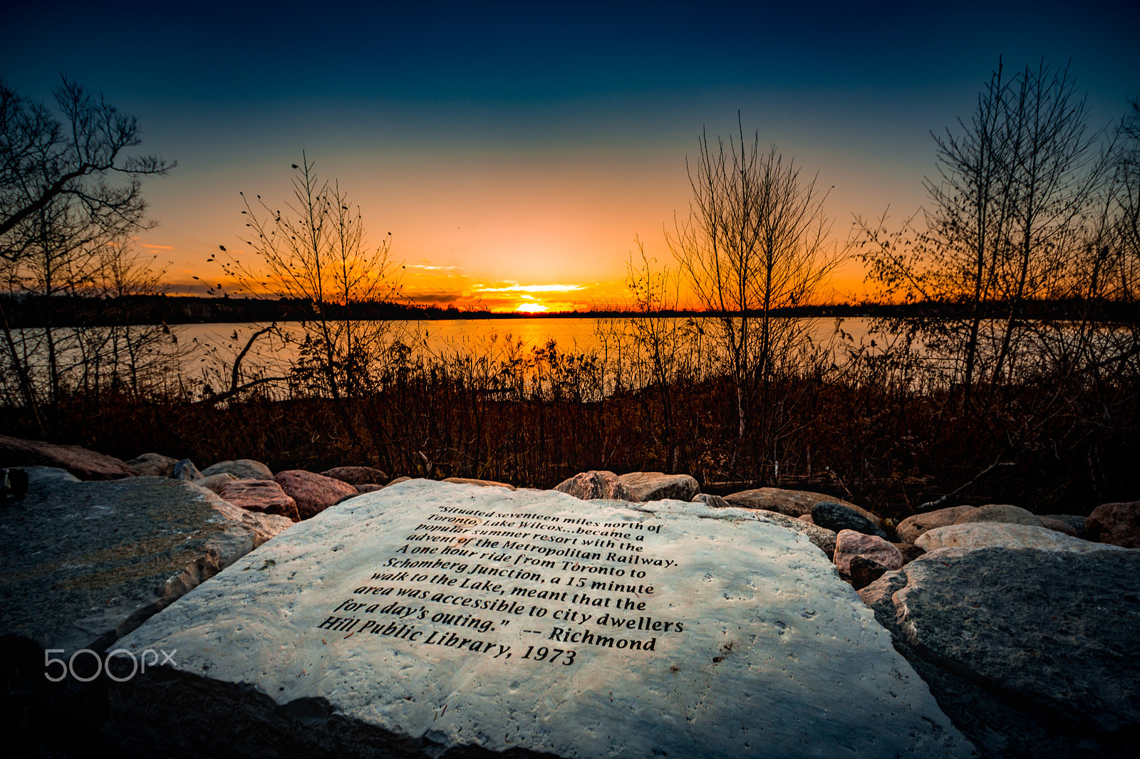 Sigma 8-16mm F4.5-5.6 DC HSM sample photo. Sunset sign photography