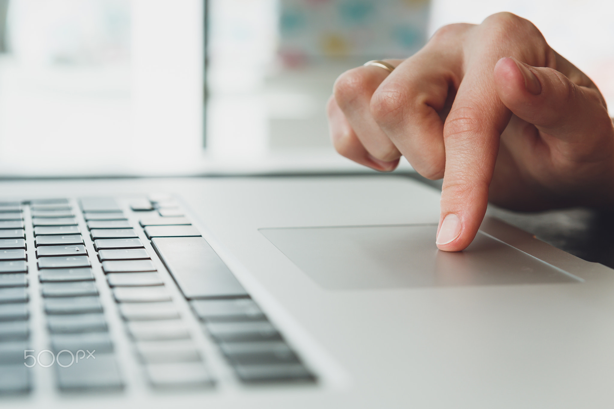 woman's hands working on laptop computer