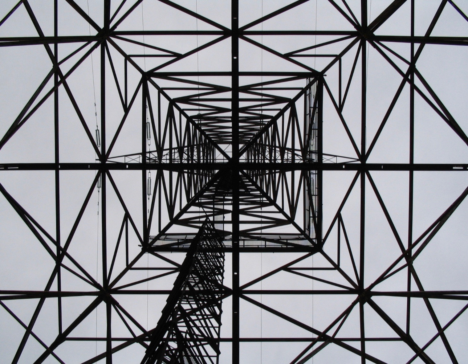 Canon POWERSHOT A75 sample photo. Looking up under a power line tower photography