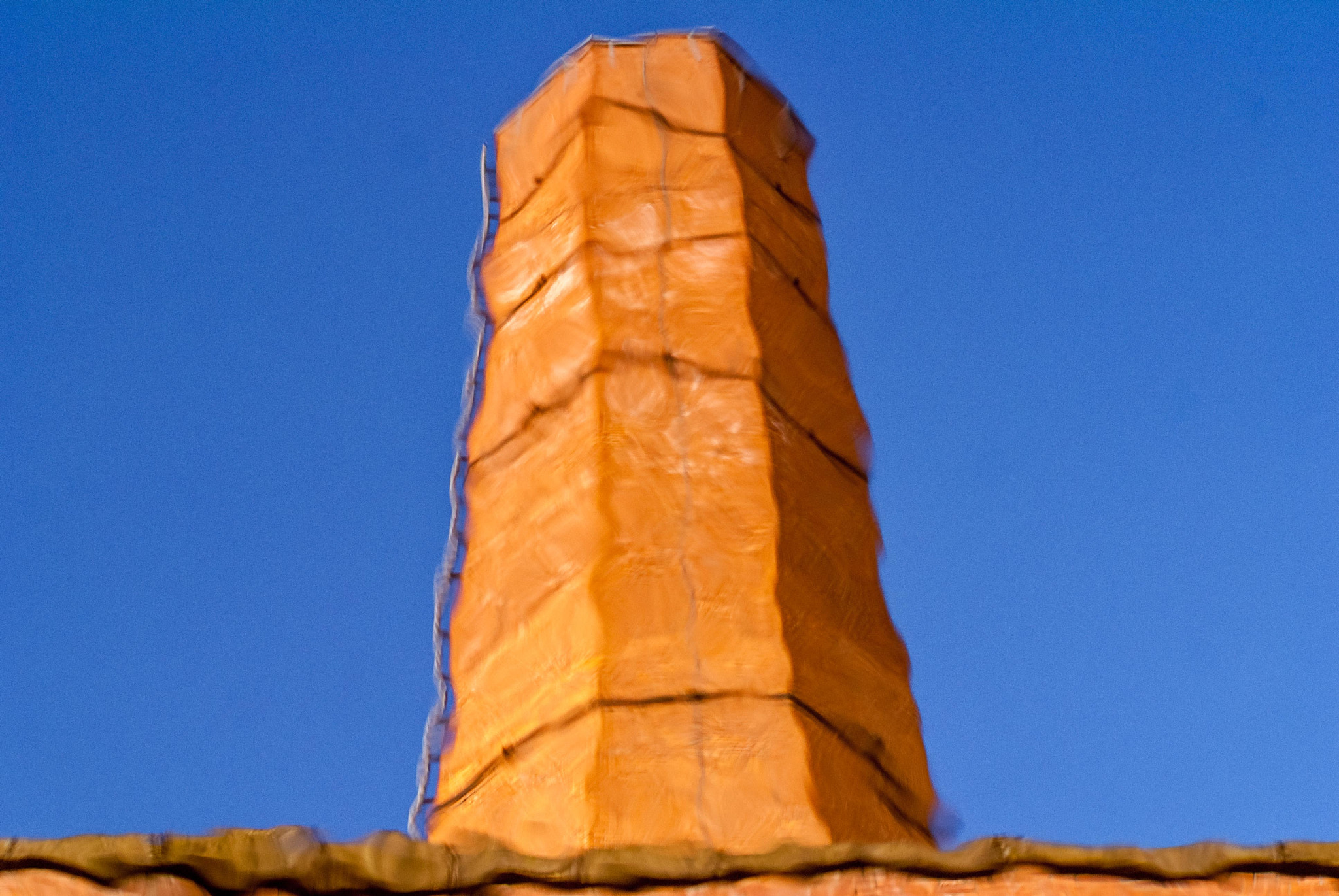 Sony Alpha DSLR-A300 + Sigma 70-300mm F4-5.6 DL Macro sample photo. Chimney reflection photography