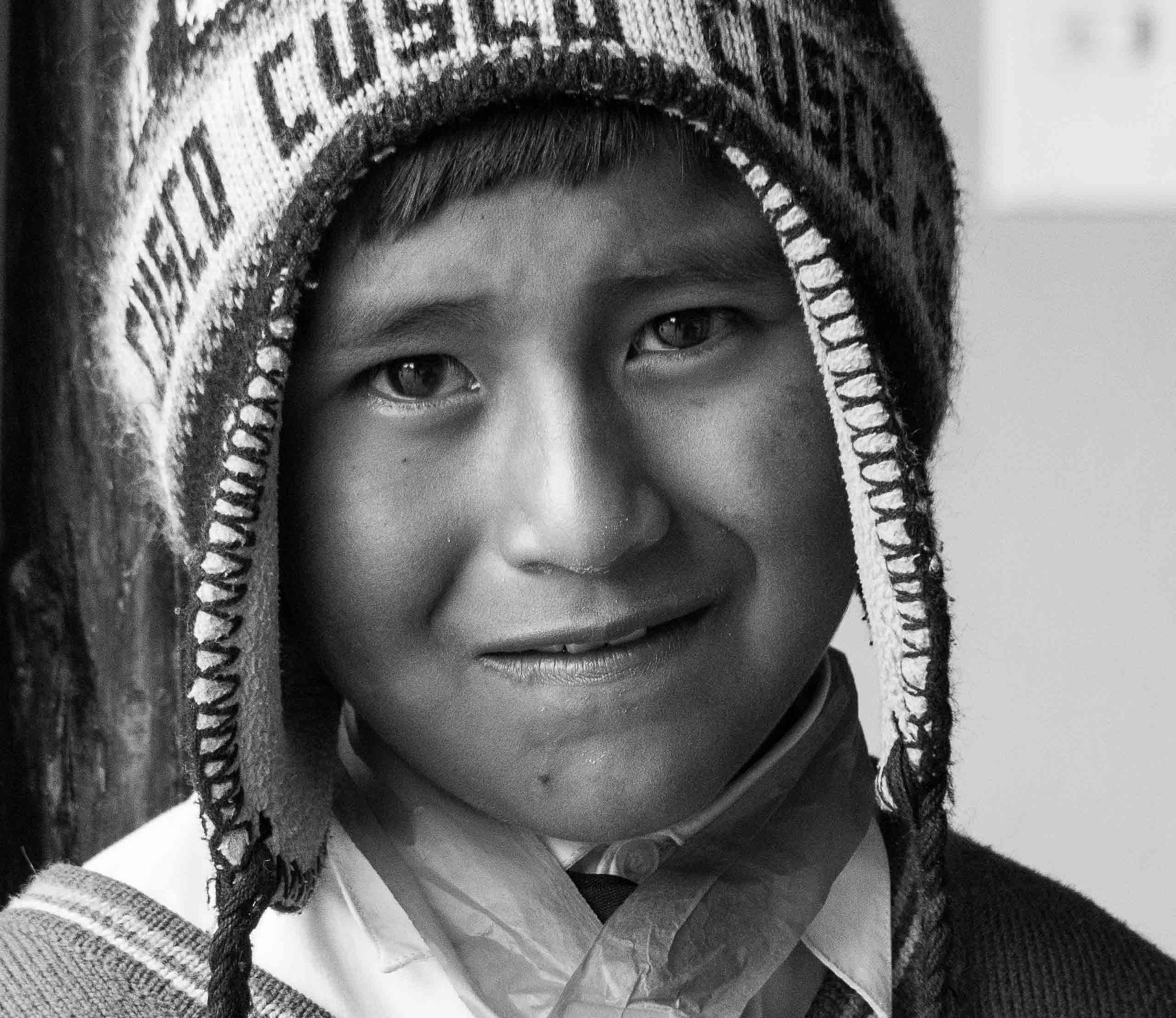 Olympus Zuiko Digital ED 40-150mm F4.0-5.6 sample photo. Peruvian childhood photography
