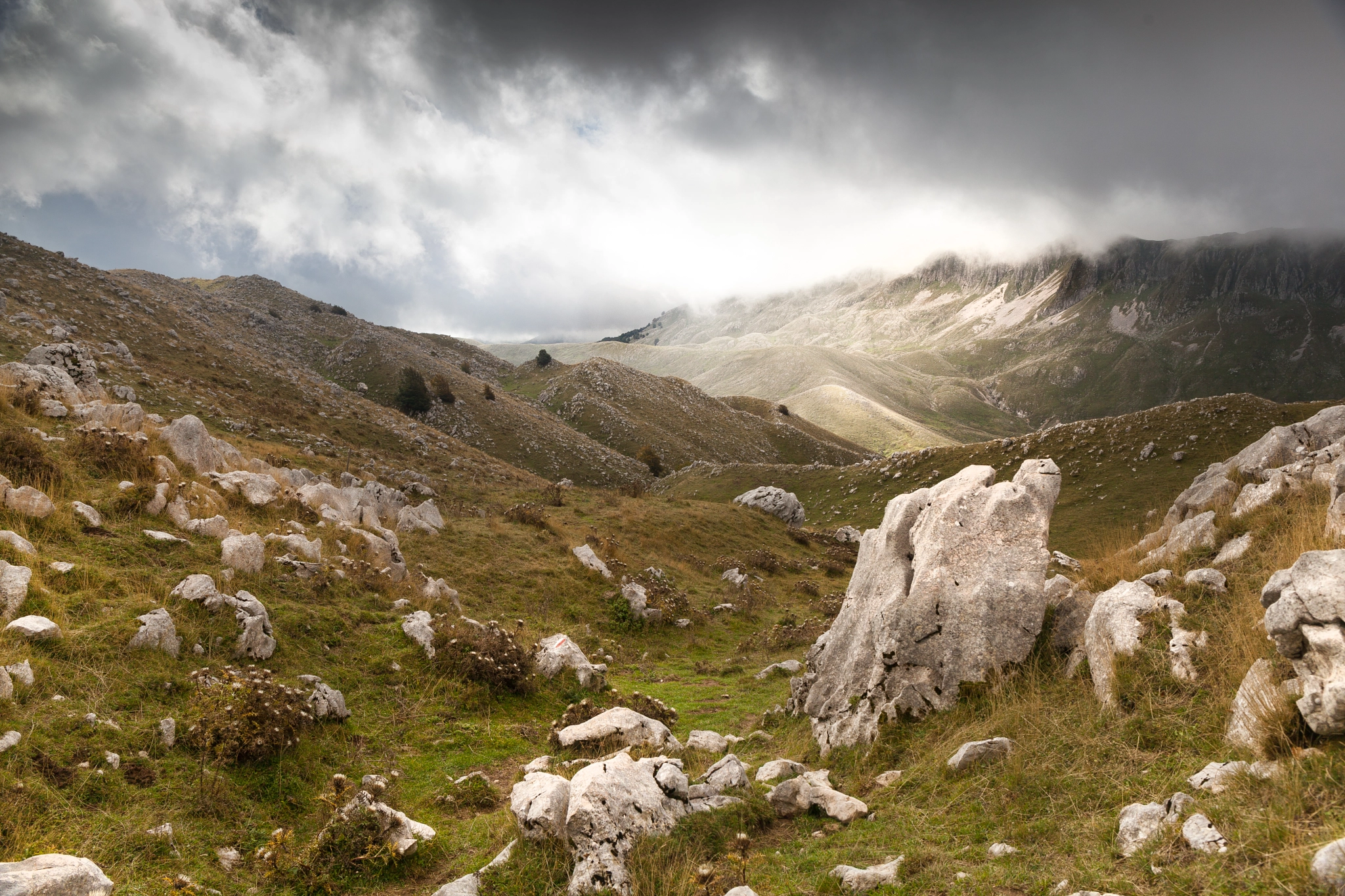 Be under a cloud