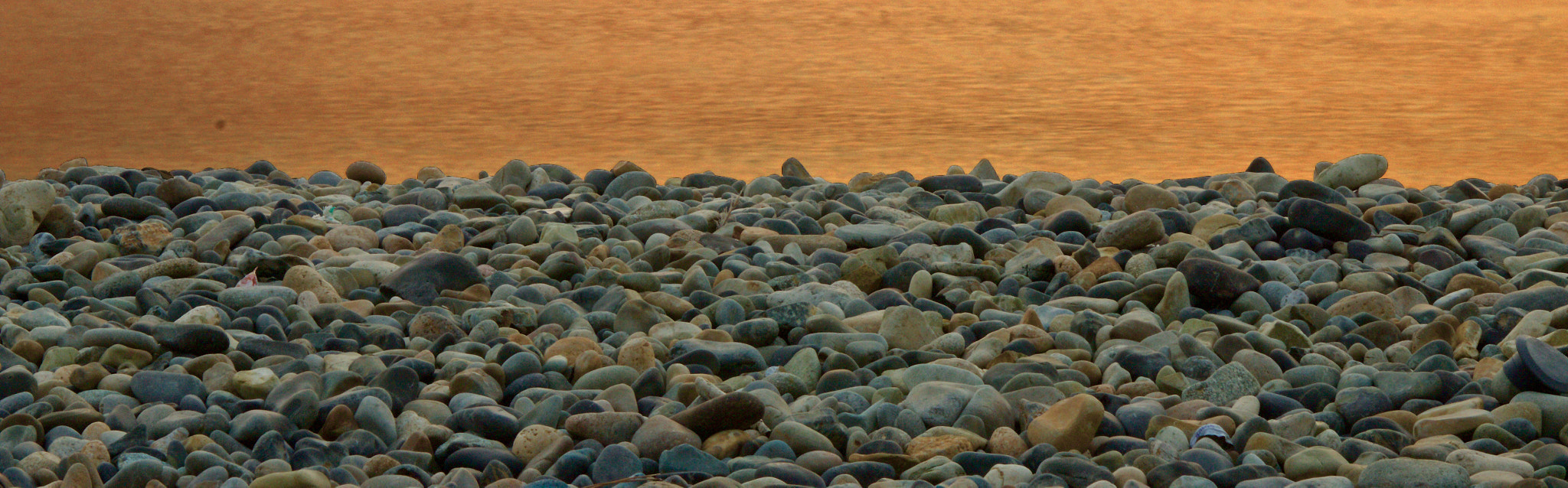 EF28-70mm f/2.8L USM sample photo. #gold #pebbles #shore #sunrise #sea #seashore #beach  photography