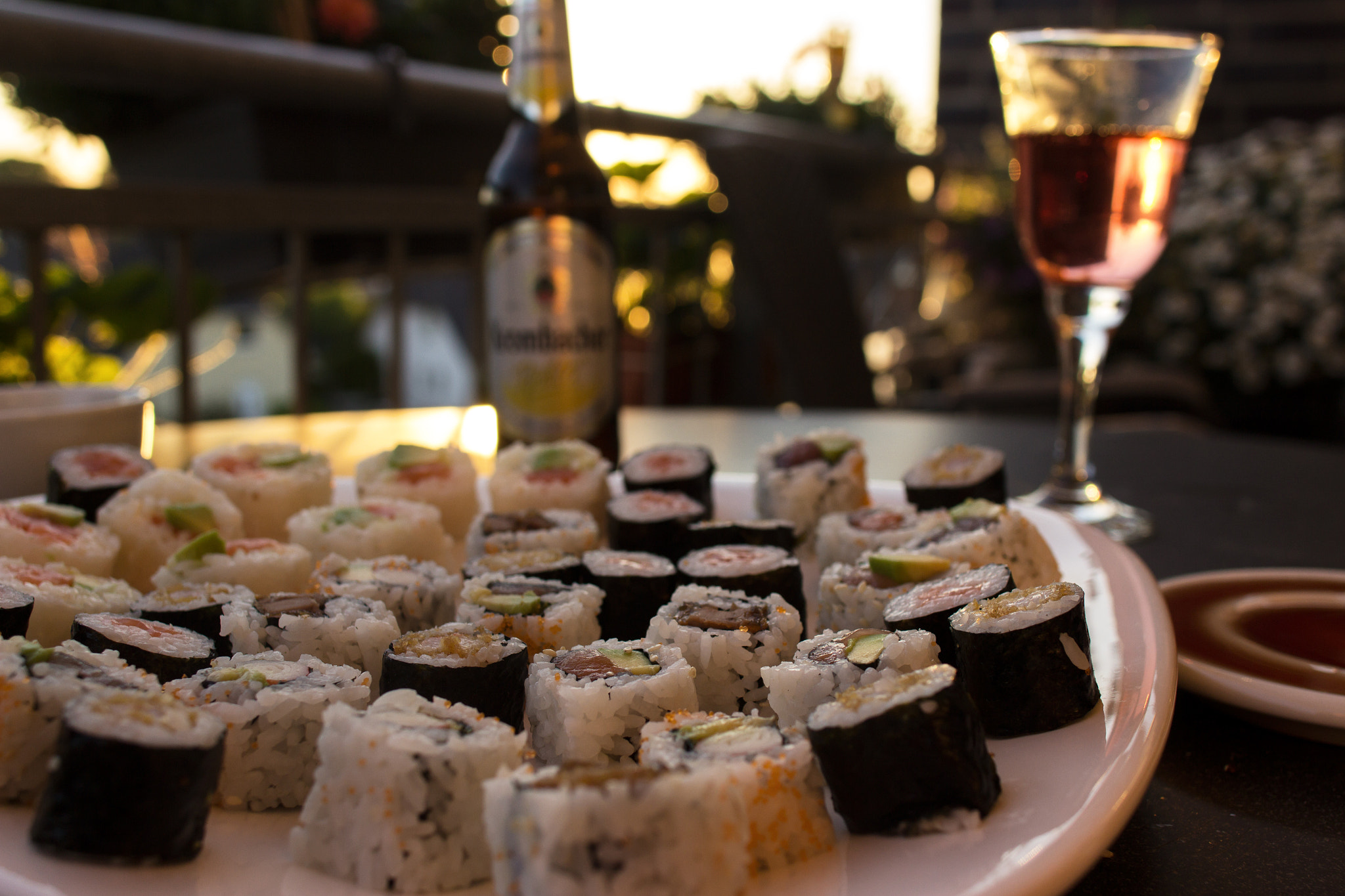 Canon EOS 600D (Rebel EOS T3i / EOS Kiss X5) + Canon EF 24mm F2.8 IS USM sample photo. Sunset sushi dinner photography