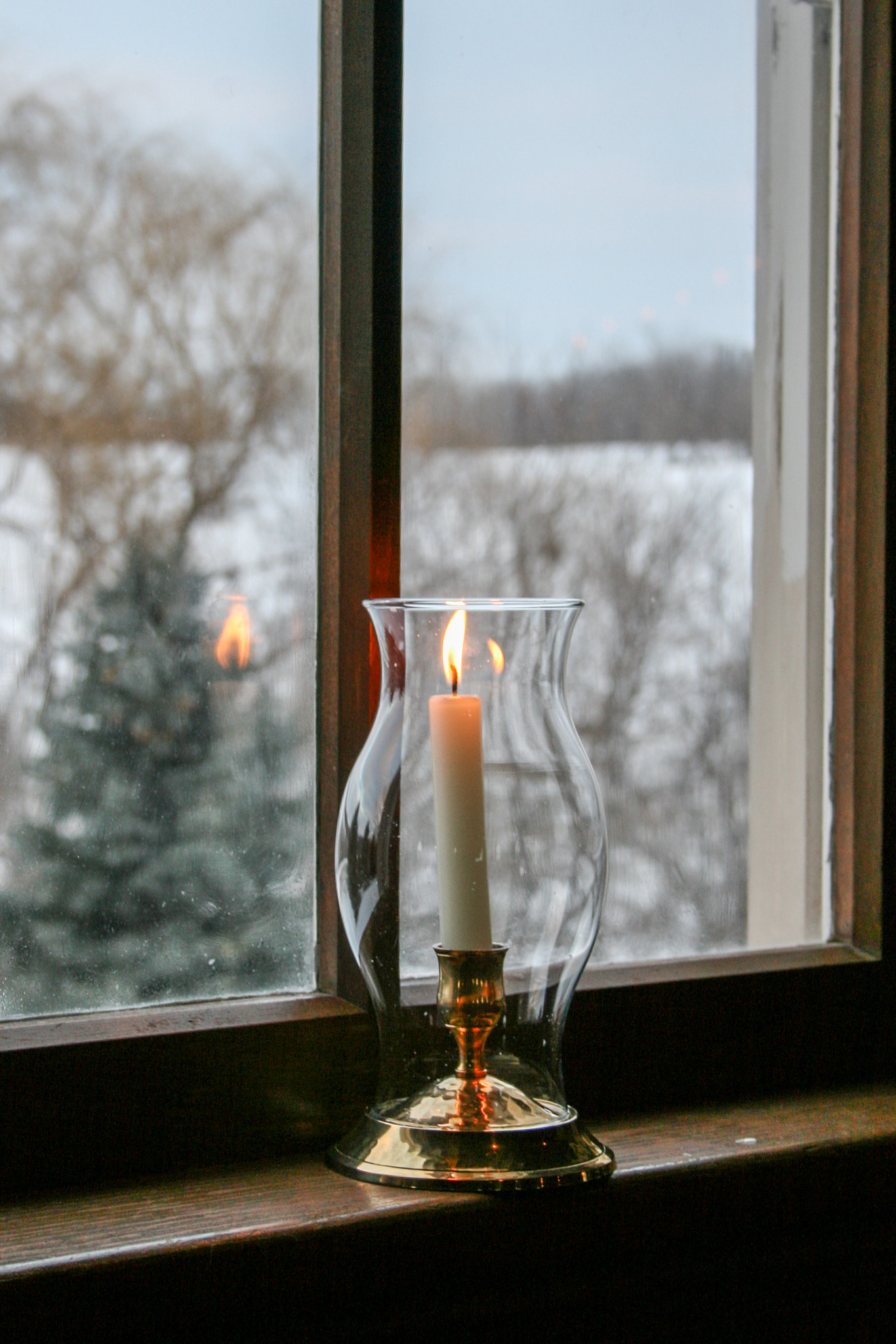 Canon EF-S 18-55mm F3.5-5.6 sample photo. Candle in the wind(ow) photography
