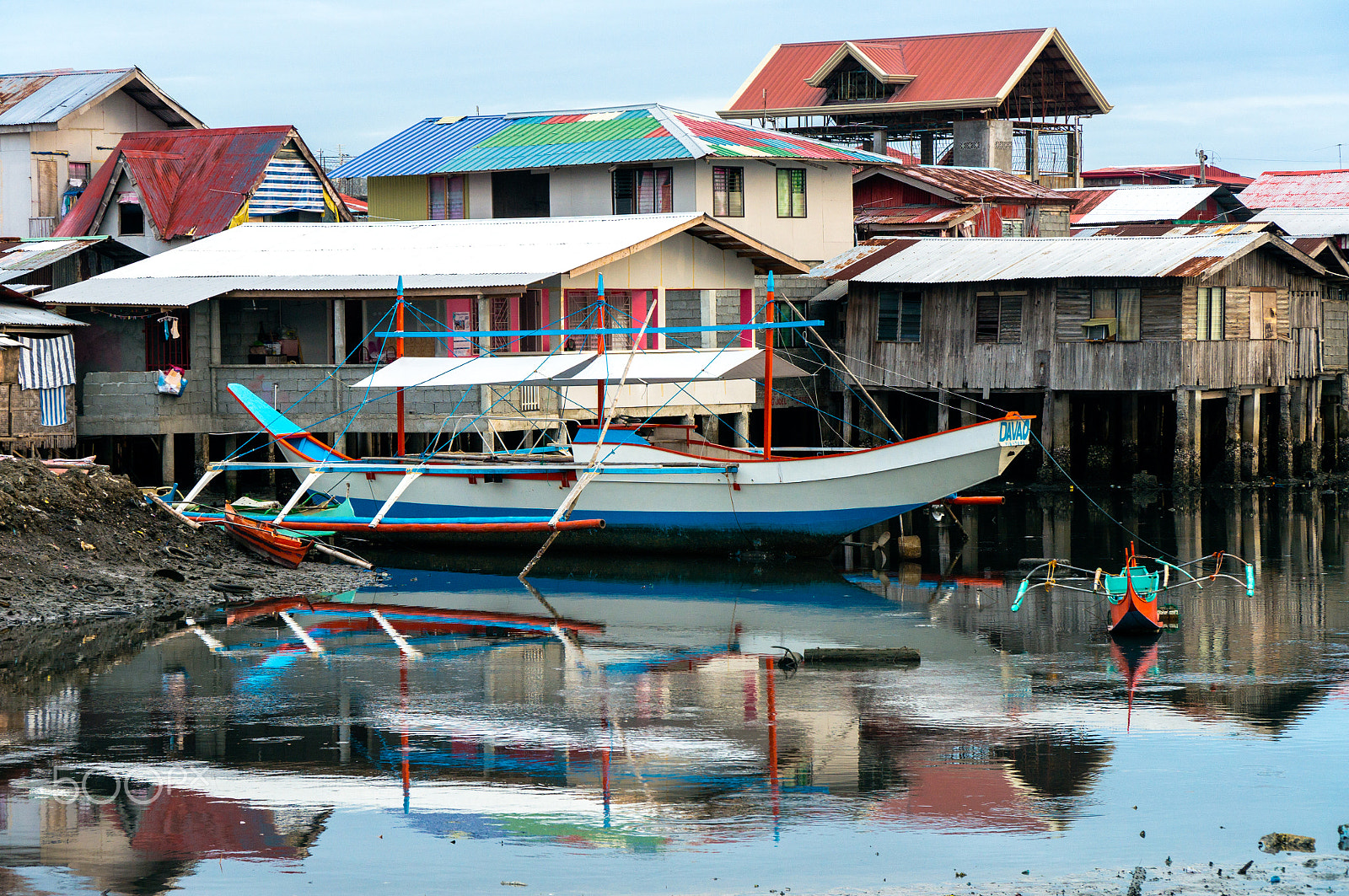Sony Alpha NEX-6 + Sony E PZ 18-105mm F4 G OSS sample photo. Boat garage photography