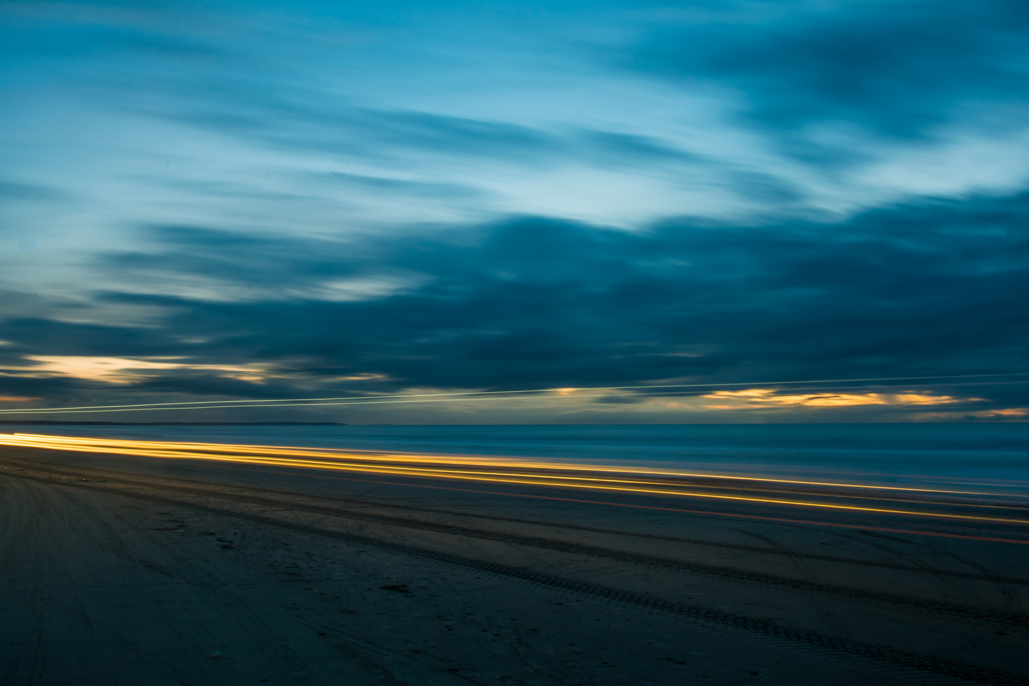 Nikon D7100 + Nikon AF-S Nikkor 20mm F1.8G ED sample photo. Driving on the beach photography