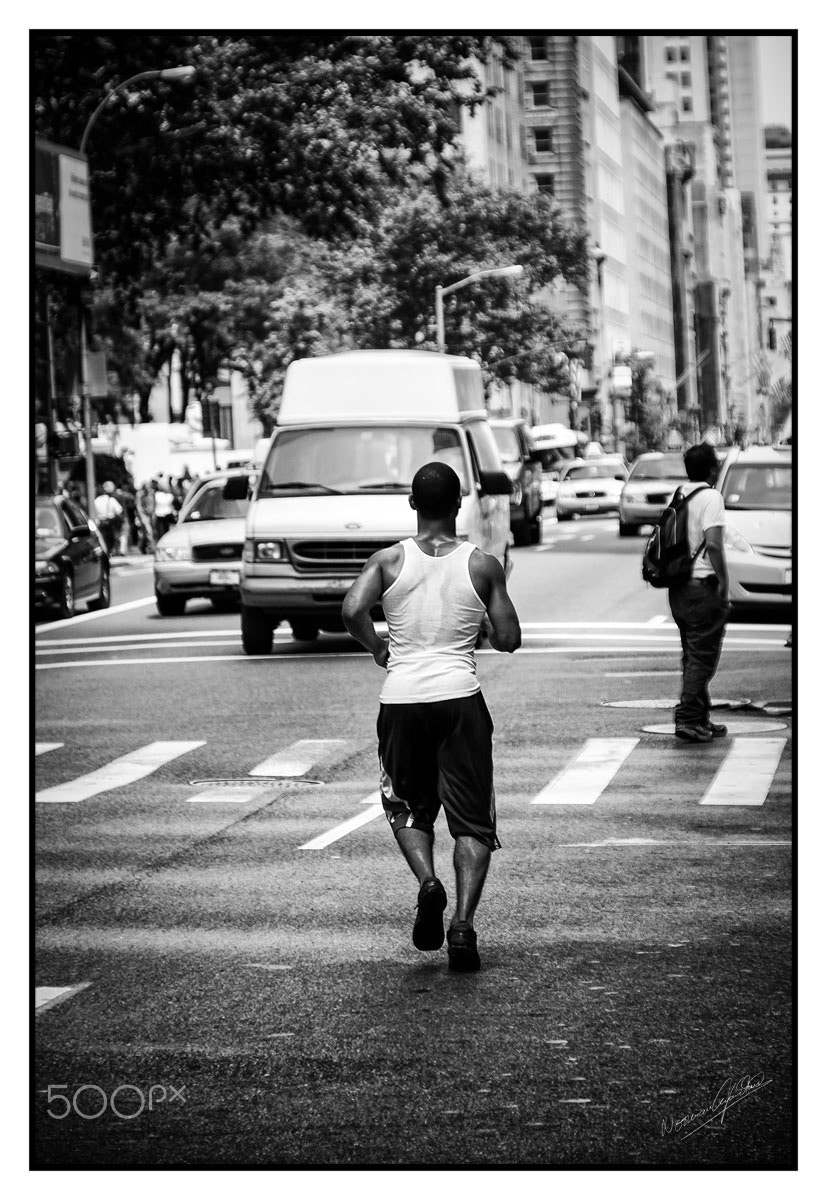 Sigma 18-200mm F3.5-6.3 DC OS HSM sample photo. Single jogger photography