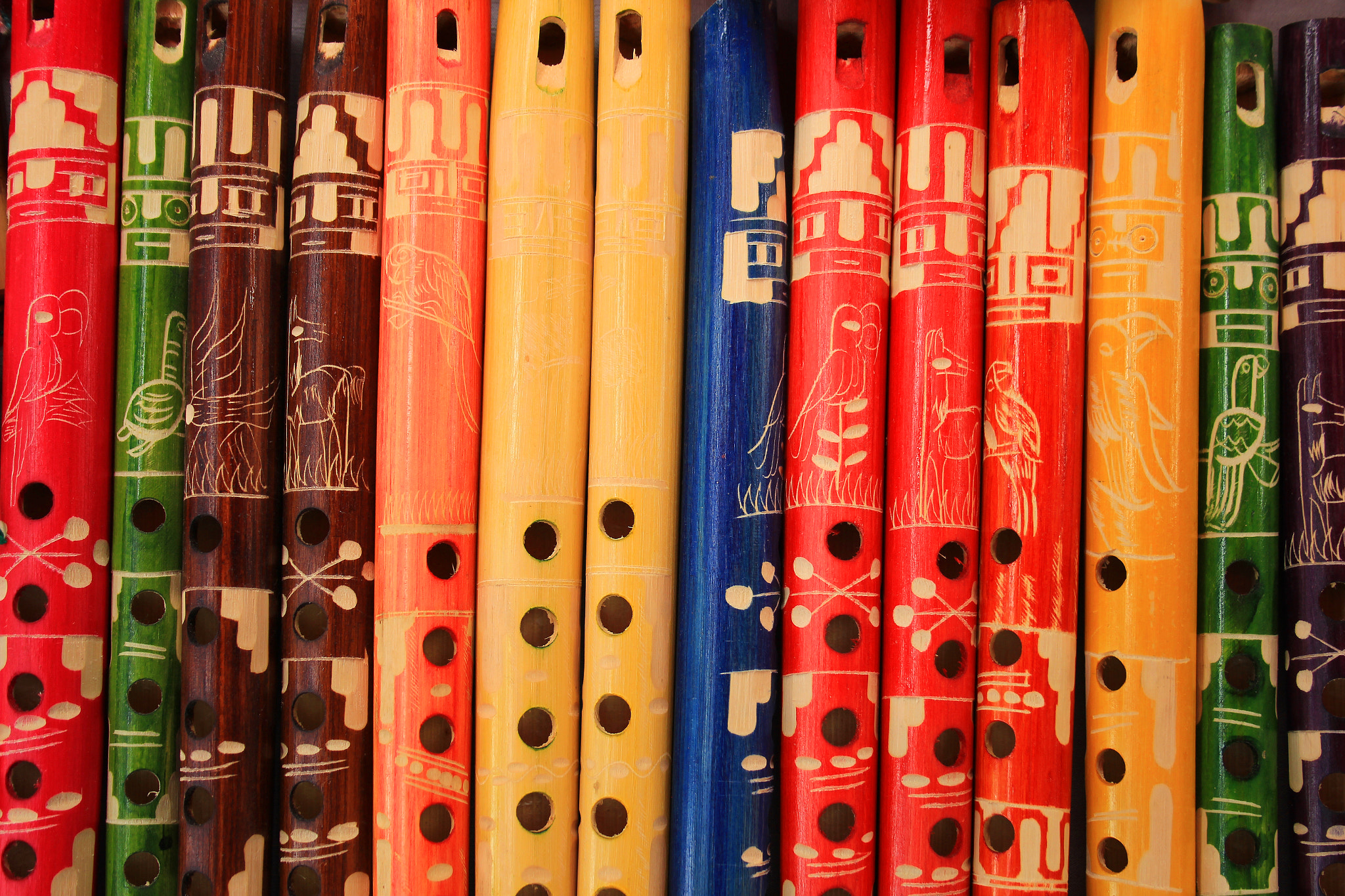 Canon EF-S 18-55mm F3.5-5.6 sample photo. Colorful wooden flutes photography