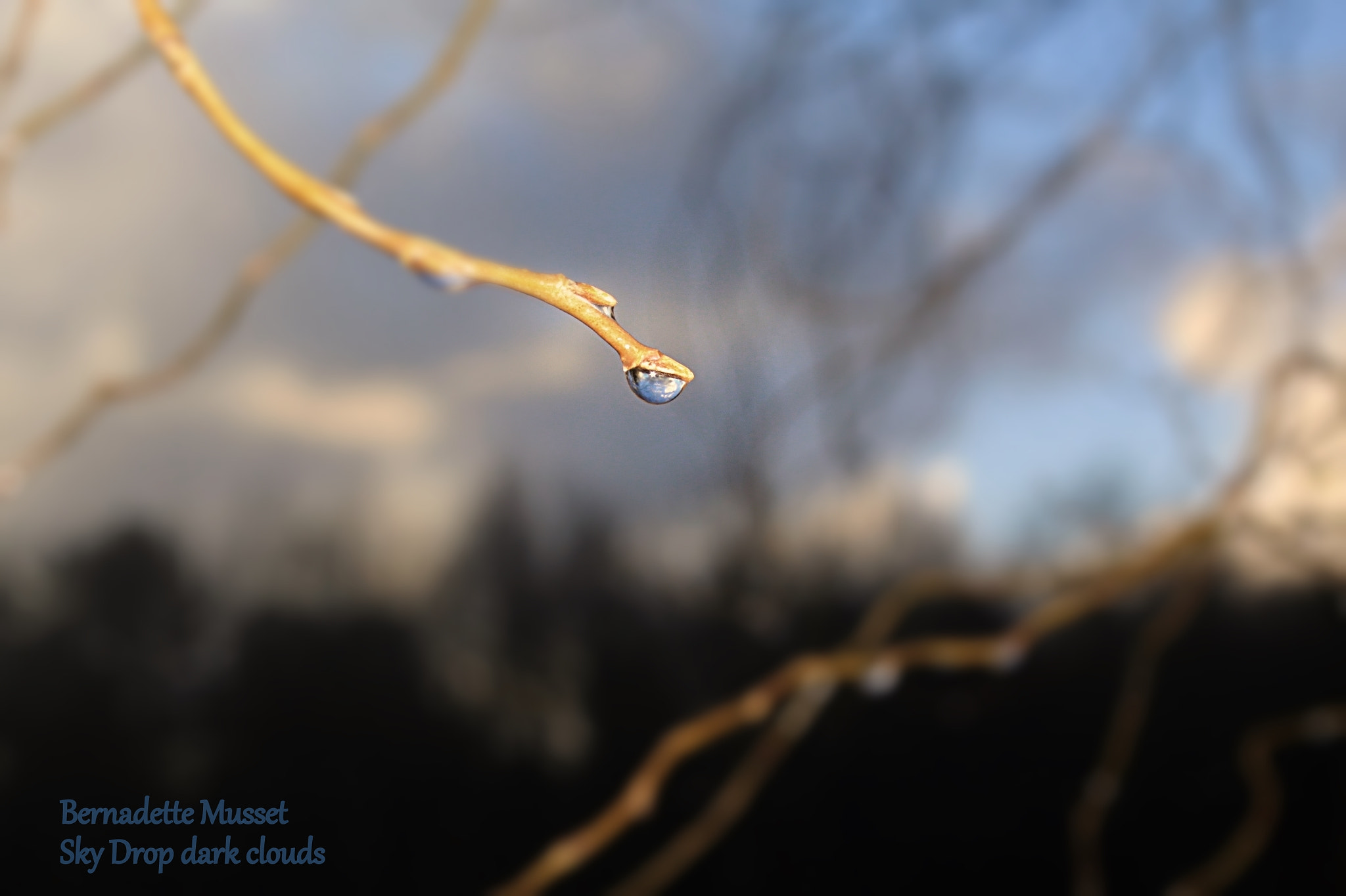 Canon EF-S 18-55mm F3.5-5.6 sample photo. Drop sky dark clouds photography
