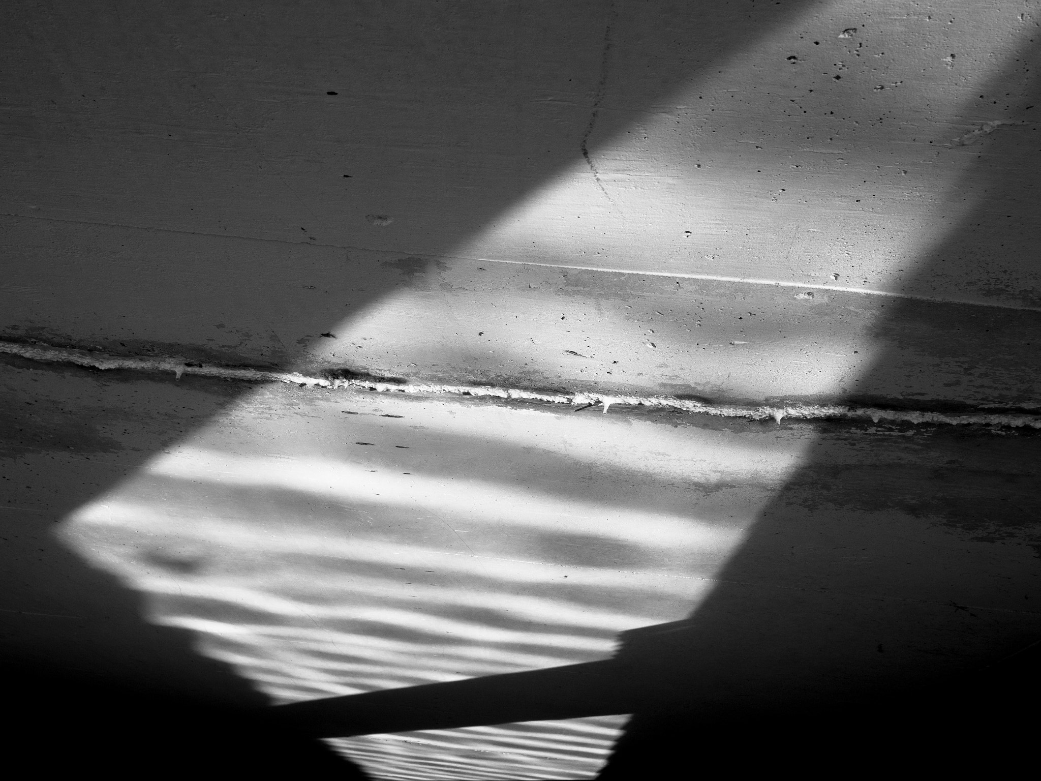 Olympus OM-D E-M10 II + Panasonic Lumix G 20mm F1.7 ASPH sample photo. Shadows under a bridge photography