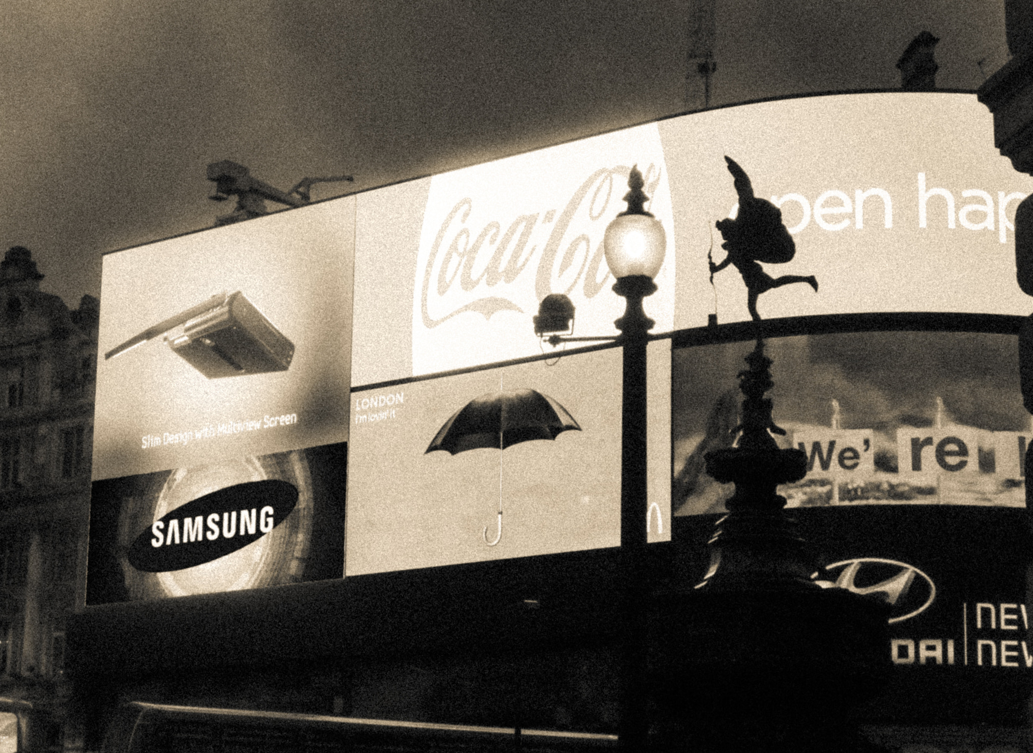 Canon PowerShot SD780 IS (Digital IXUS 100 IS / IXY Digital 210 IS) sample photo. Picadilly circus time machine photography