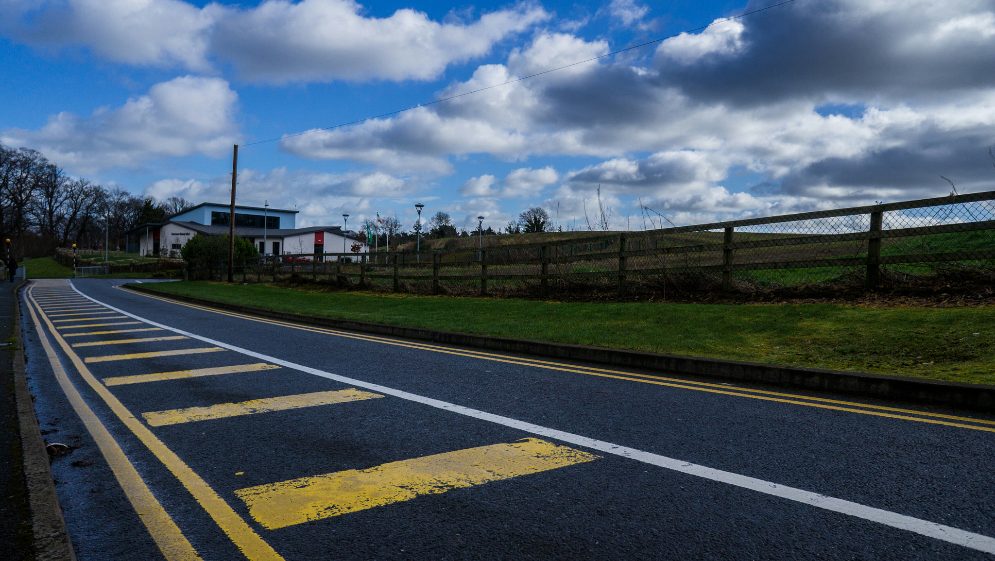 Sony Alpha NEX-F3 + Sony E 16mm F2.8 sample photo. A road to get past your fences photography