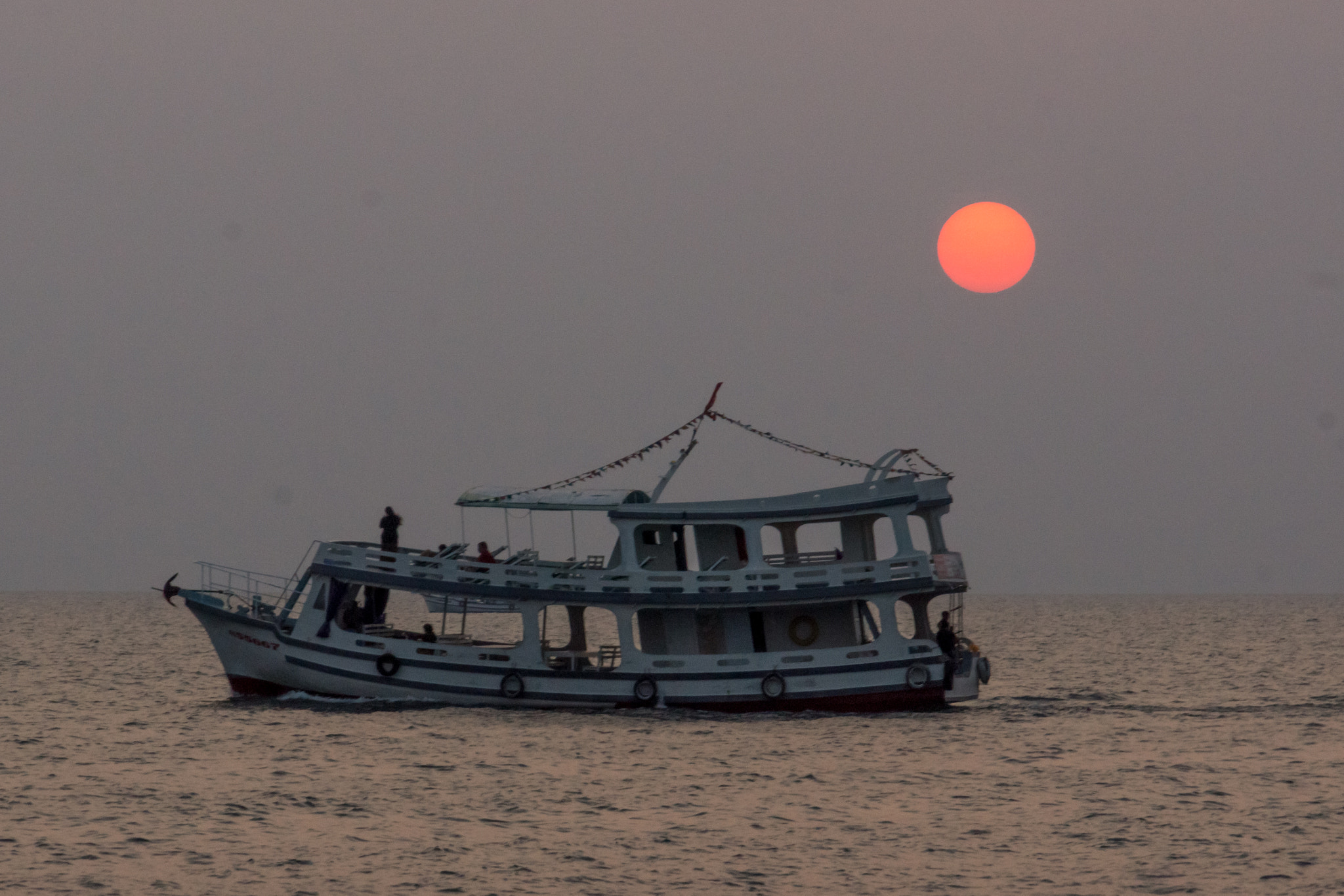 Sony SLT-A77 sample photo. Boat in sunset photography