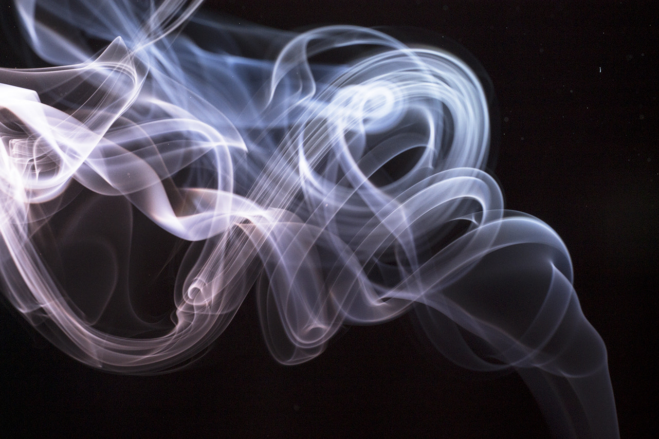 Canon EOS 1100D (EOS Rebel T3 / EOS Kiss X50) + Canon EF 50mm F1.4 USM sample photo. Smoke photography