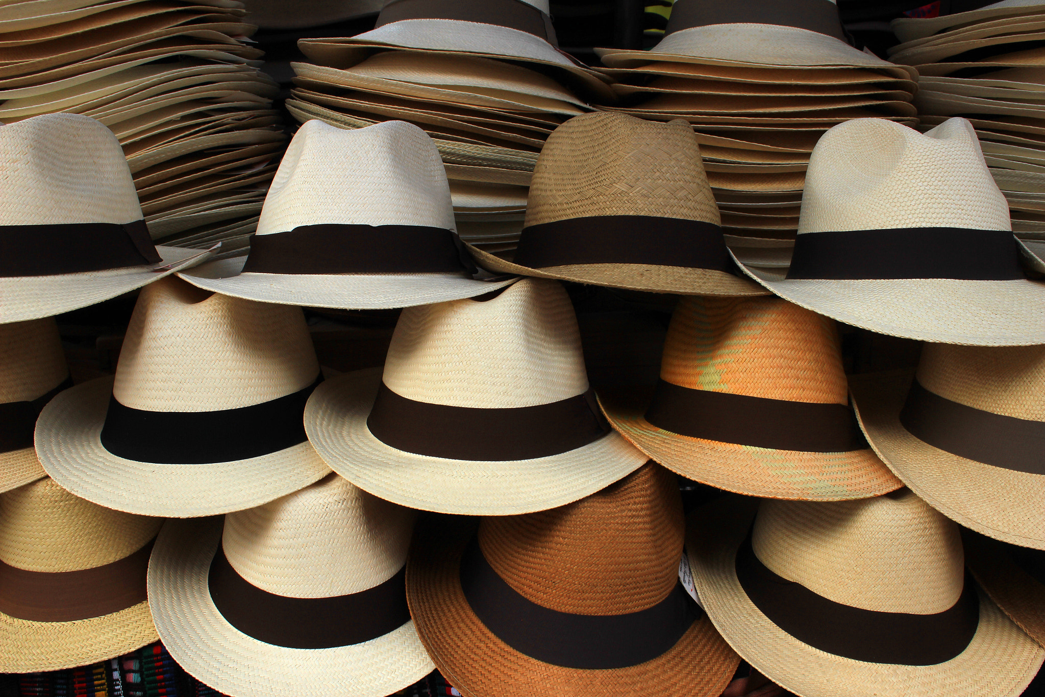 Canon EF-S 18-55mm F3.5-5.6 sample photo. Hats at the market photography