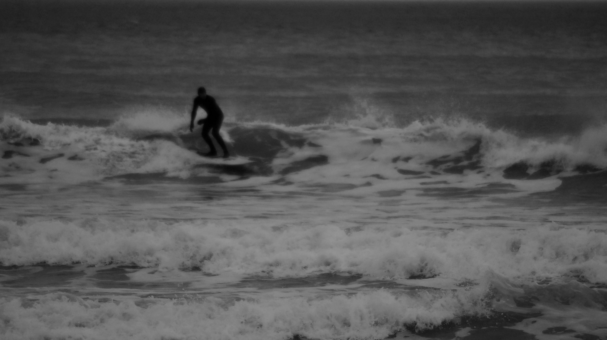 Sigma 70-300mm F4-5.6 APO Macro Super II sample photo. Dark surfer photography