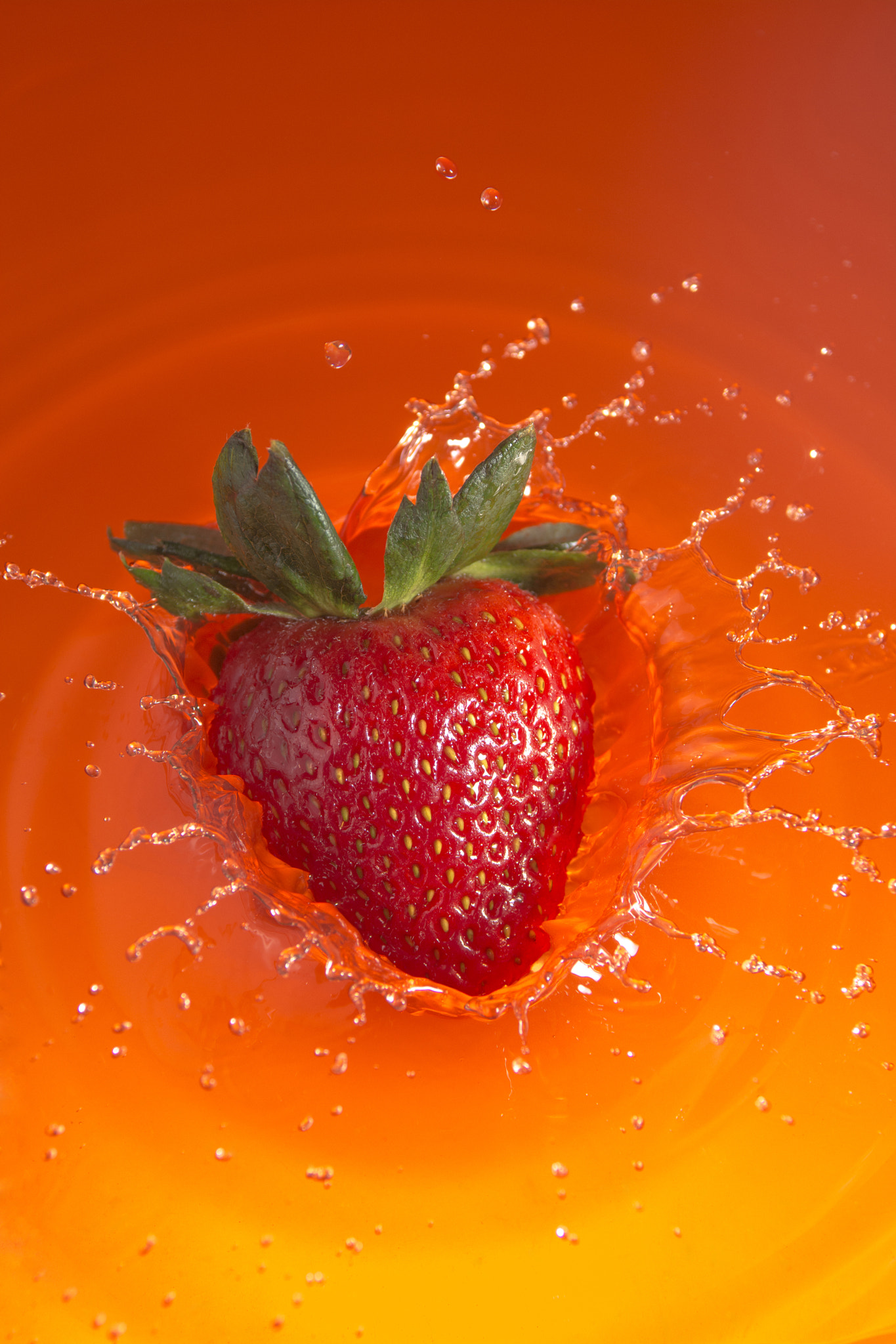 Nikon AF-S Nikkor 28-70mm F2.8 ED-IF sample photo. Fresh strawberry splashing into juice photography