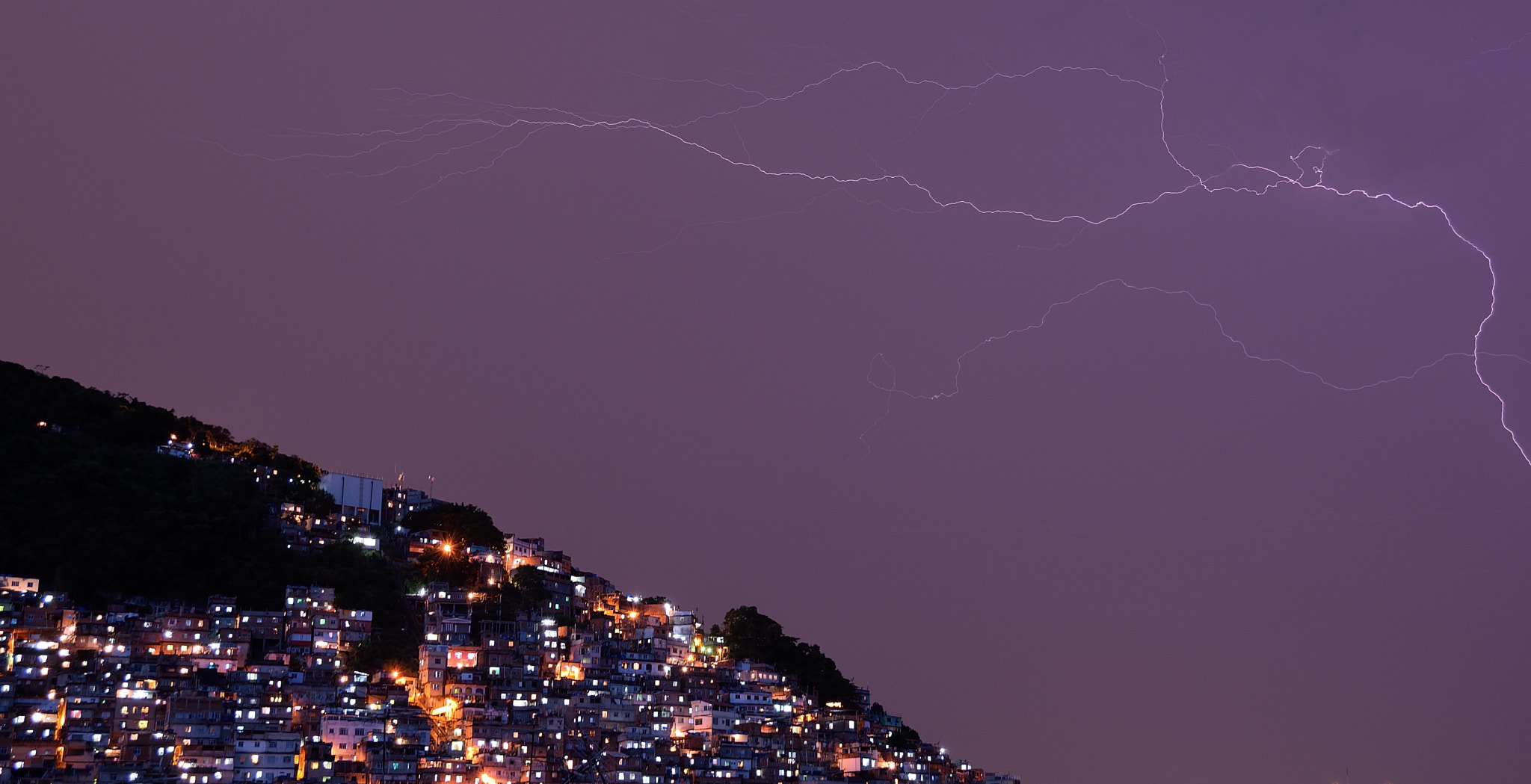 Nikon D3300 + Nikon AF-S DX Nikkor 18-200mm F3.5-5.6G ED VR II sample photo. Storm over the favela photography