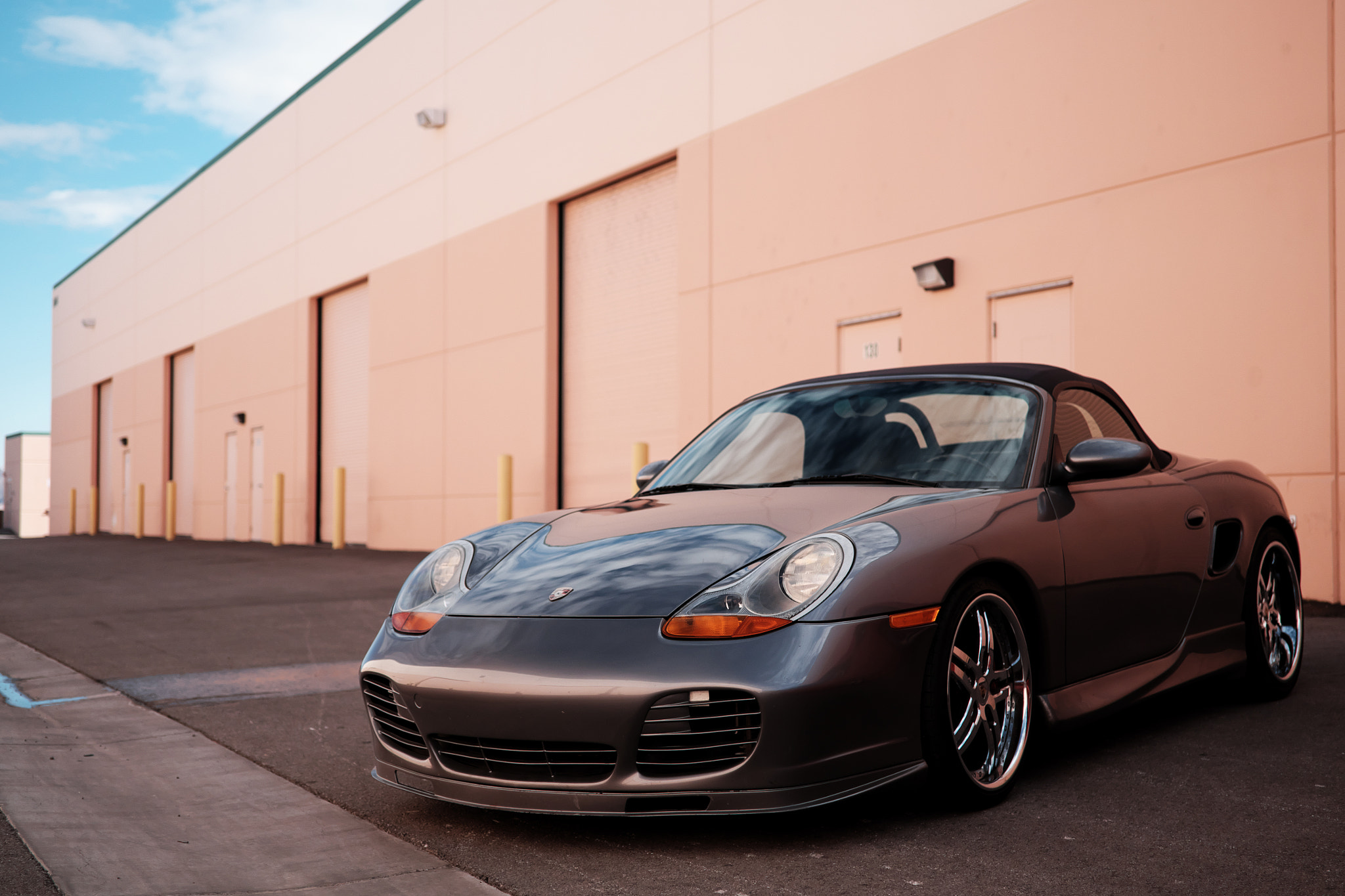 Fujifilm X-T10 + ZEISS Touit 32mm F1.8 sample photo. Porsche at the warehouse photography