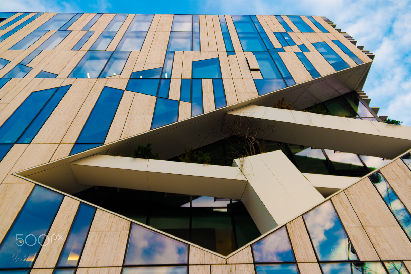Samsung NX 18-200mm F3.5-6.3 ED OIS sample photo. Blue city photography