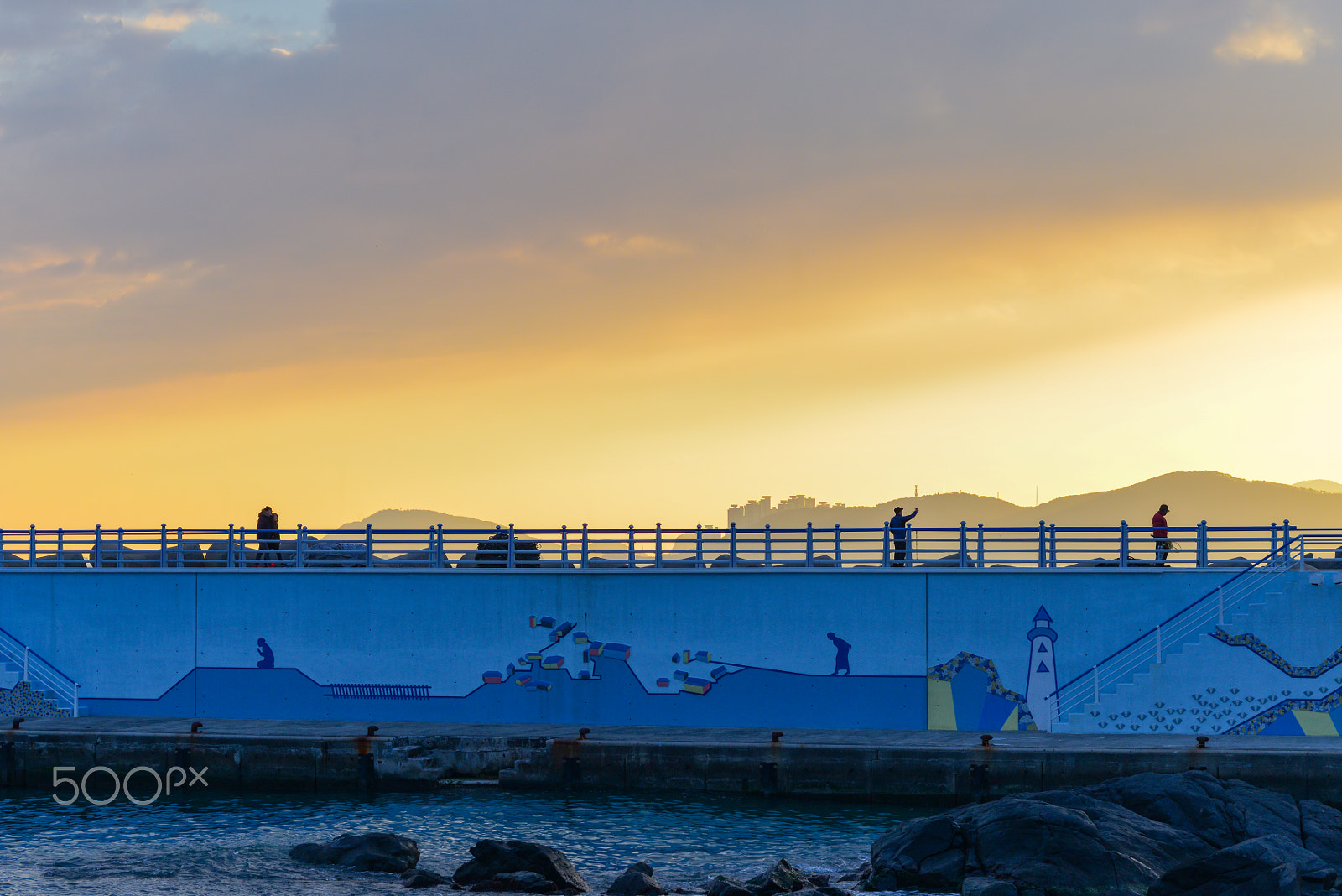 Nikon D800E + AF Zoom-Nikkor 80-200mm f/2.8 ED sample photo. Sunset adds finishing touches to a mural photography