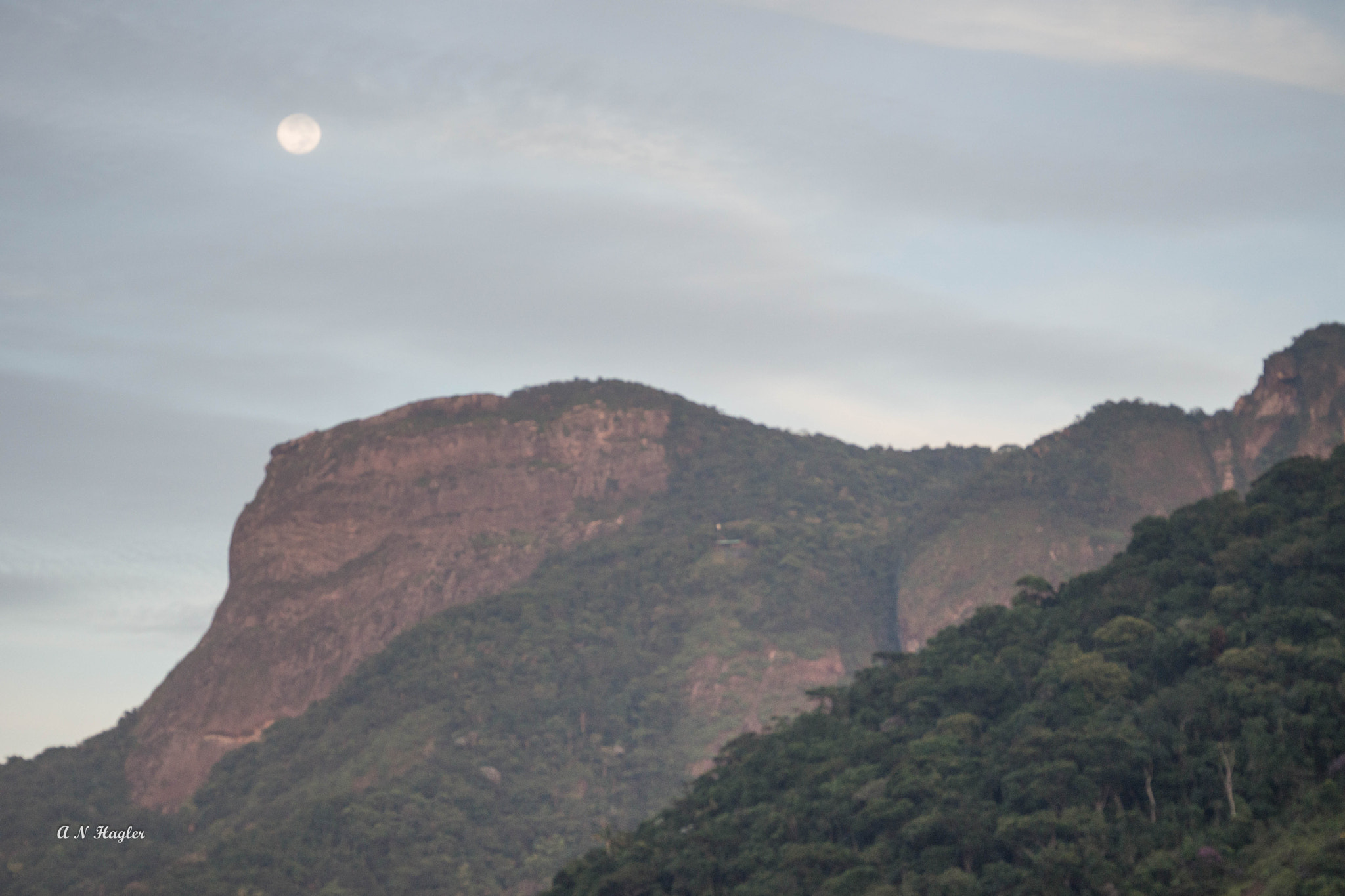 Sony a99 II + Tamron SP 70-300mm F4-5.6 Di USD sample photo. Moon in clouds over pedra bonita photography