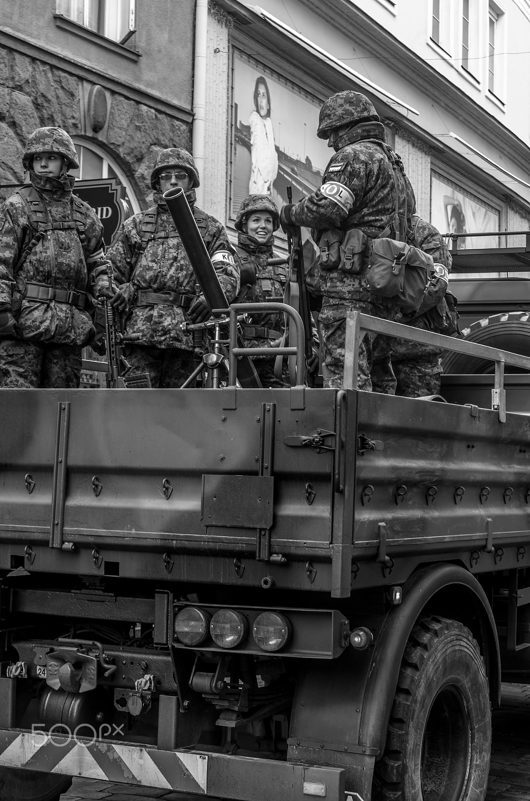 Pentax K-50 + Tamron AF 28-75mm F2.8 XR Di LD Aspherical (IF) sample photo. Happy soldier on military vehicle and frightened girl on a poste photography