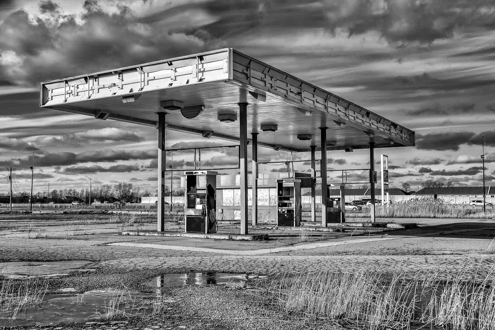Sony Alpha DSLR-A500 sample photo. Stop 50 gas station abandoned b+w photography