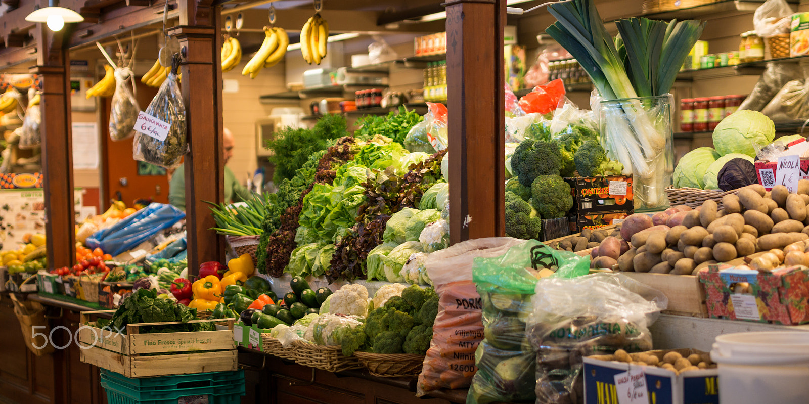 Panasonic Lumix DMC-GF7 sample photo. Vegetable stall in old market hall photography