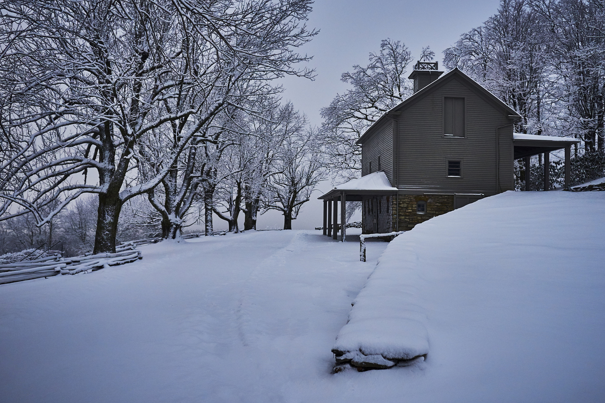 Sony a99 II + Minolta AF 28-70mm F2.8 G sample photo. Carrage barn in snow photography
