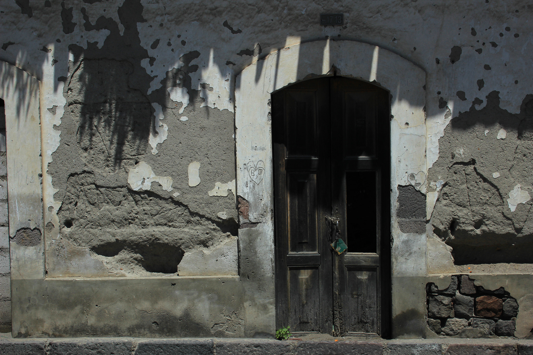 Canon EF-S 18-55mm F3.5-5.6 sample photo. Wood door in an adobe wall photography