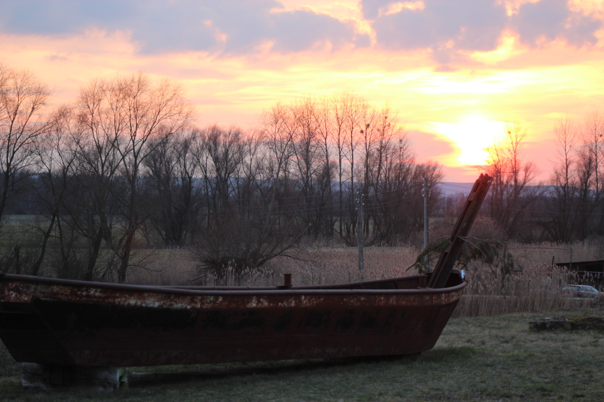 Canon EF 80-200mm F4.5-5.6 II sample photo. Boat in sunset photography
