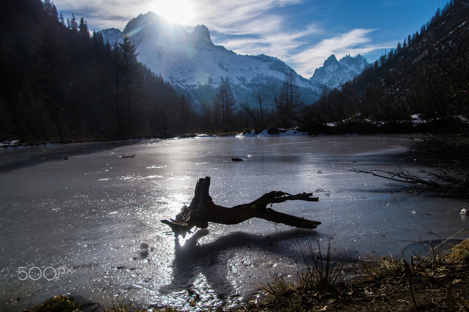 Tamron 18-270mm F3.5-6.3 Di II PZD sample photo. Frozen lake with dead wood in the french alps photography