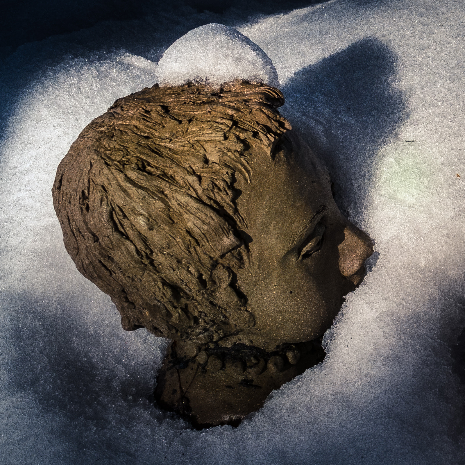 Fujifilm X-E1 + Fujifilm XF 23mm F1.4 R sample photo. Baby head in snow photography