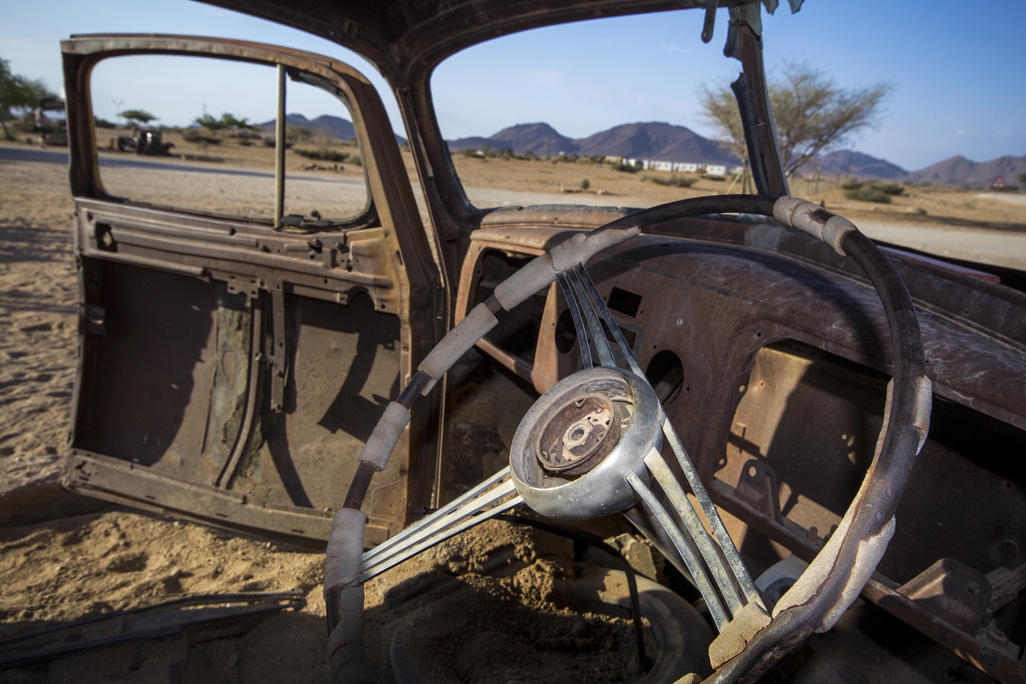 Canon EOS 1200D (EOS Rebel T5 / EOS Kiss X70 / EOS Hi) + Sigma 10-20mm F4-5.6 EX DC HSM sample photo. Rusty wheels photography