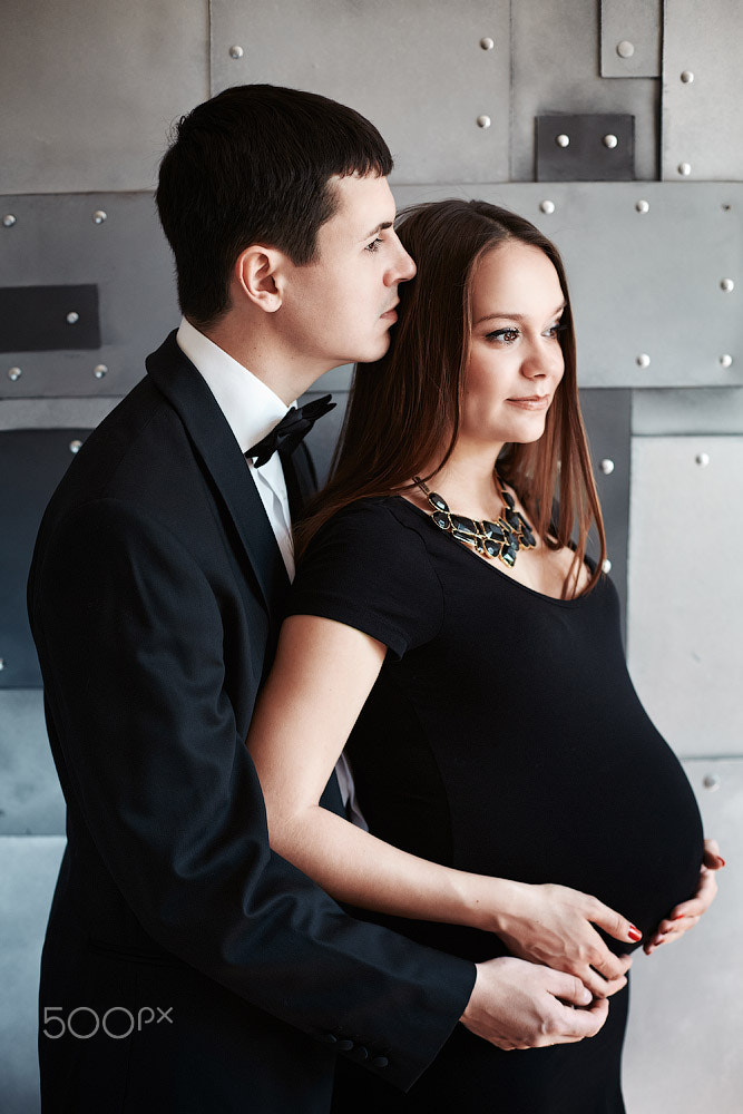 Young happy pregnant couple