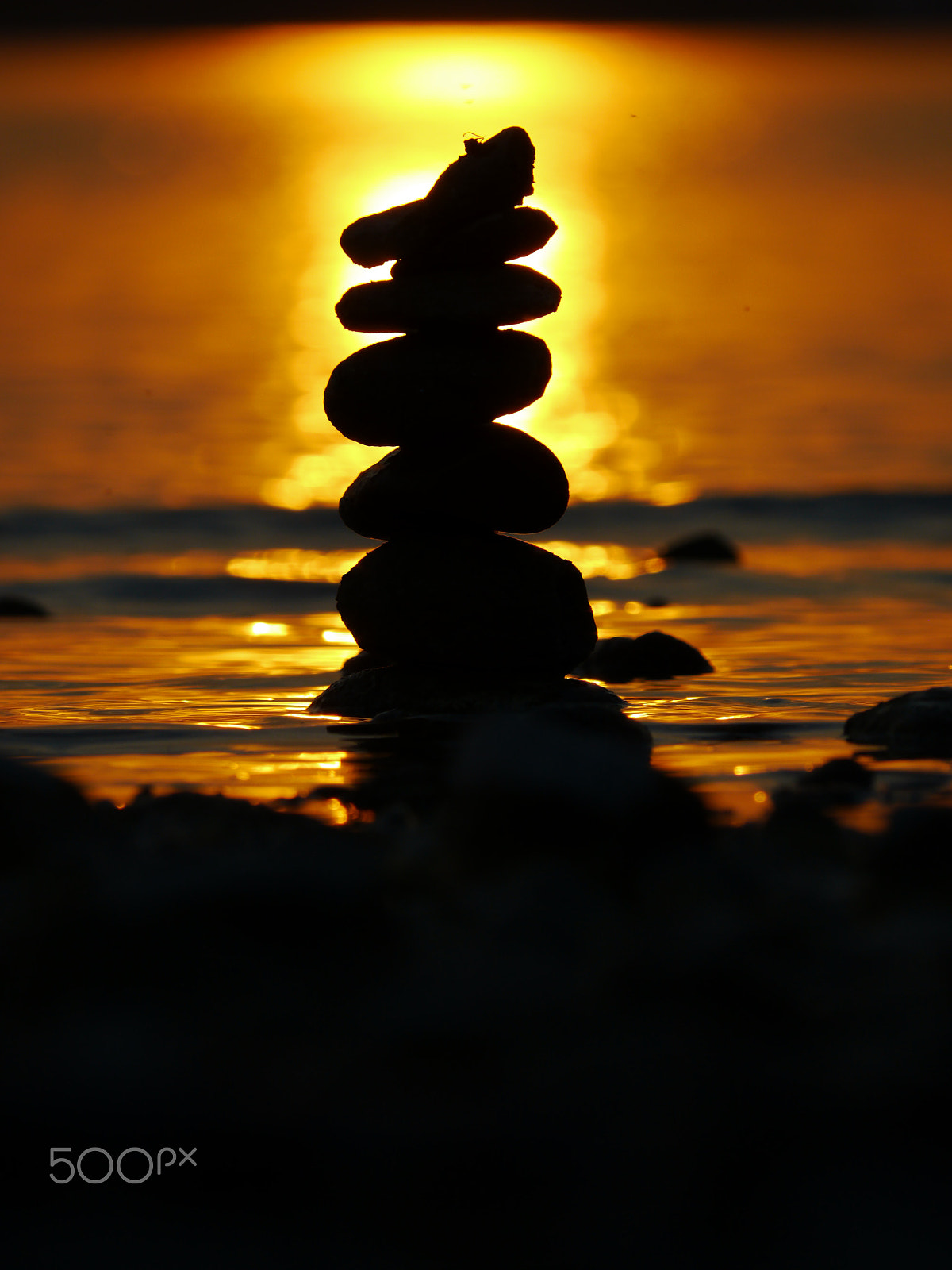 Panasonic Lumix DMC-GH2 sample photo. Stapled stones lake sunset photography