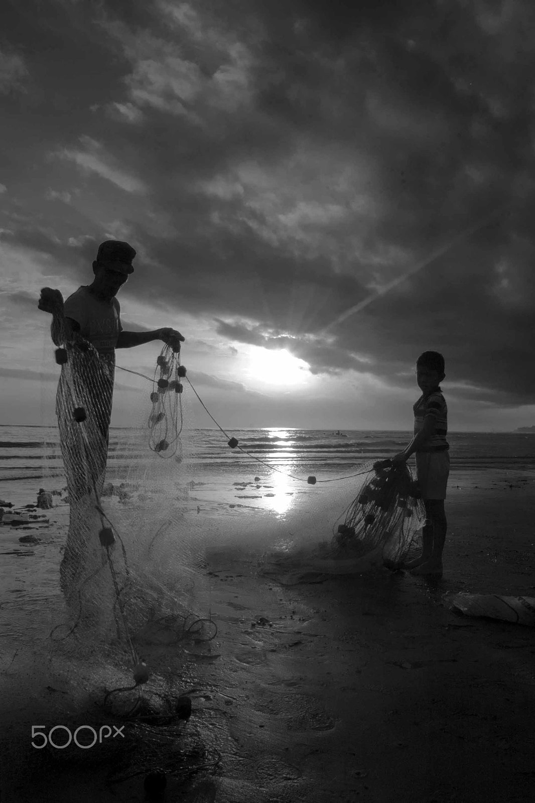 Nikon D70 sample photo. Like father like son in bw photography