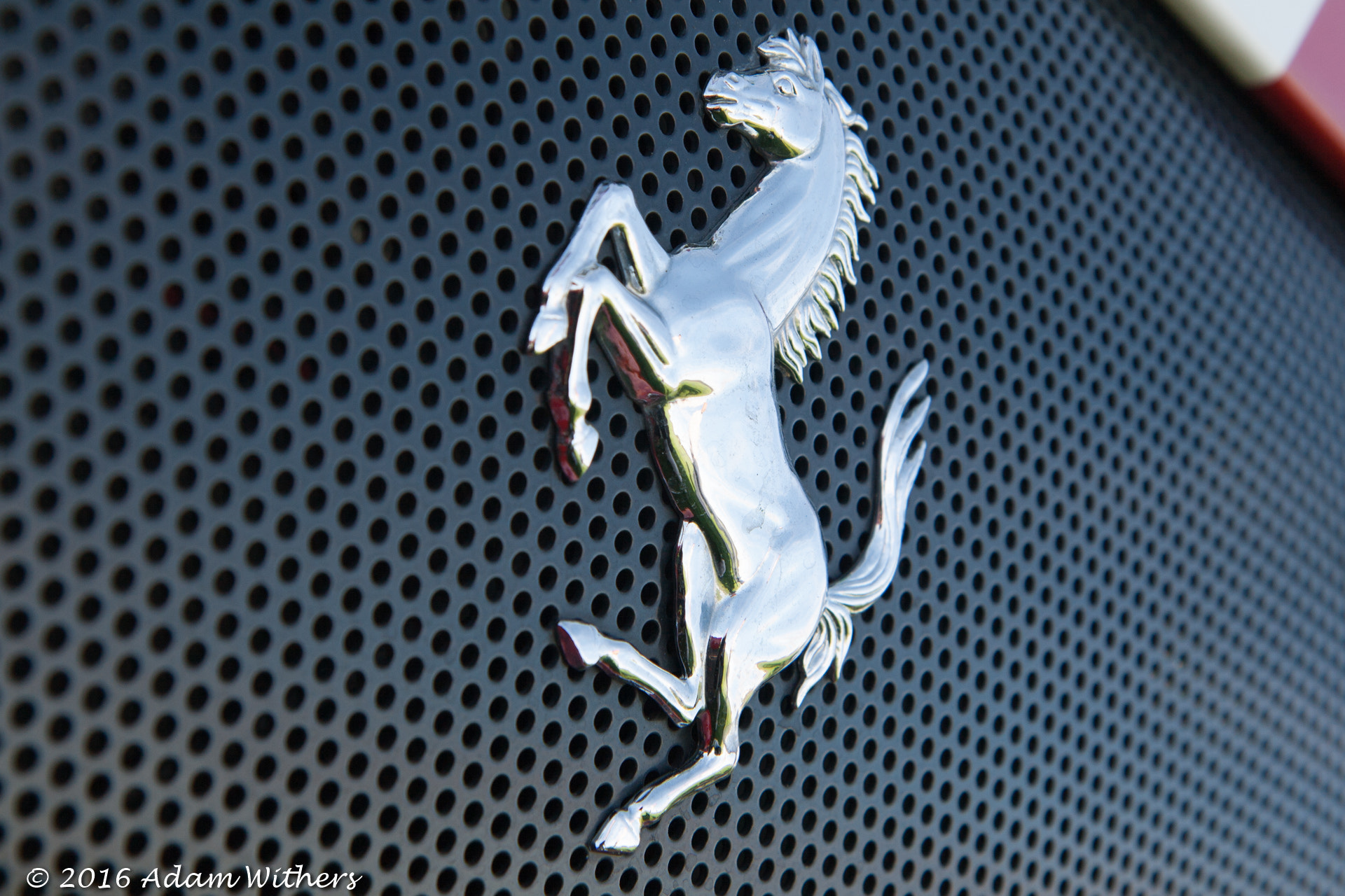 Canon EOS 400D (EOS Digital Rebel XTi / EOS Kiss Digital X) sample photo. Ferrari prancing horse badge photography