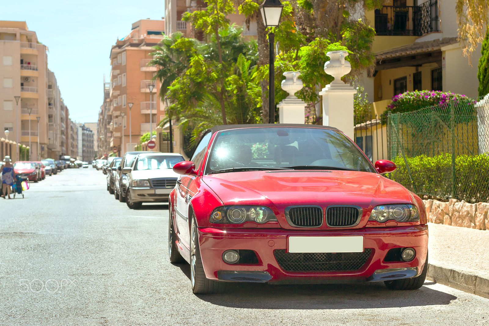 Nikon D3100 + Sigma 50mm F1.4 EX DG HSM sample photo. Red modern coupe-car bmw m3 series on sunny street, torrevieja, photography