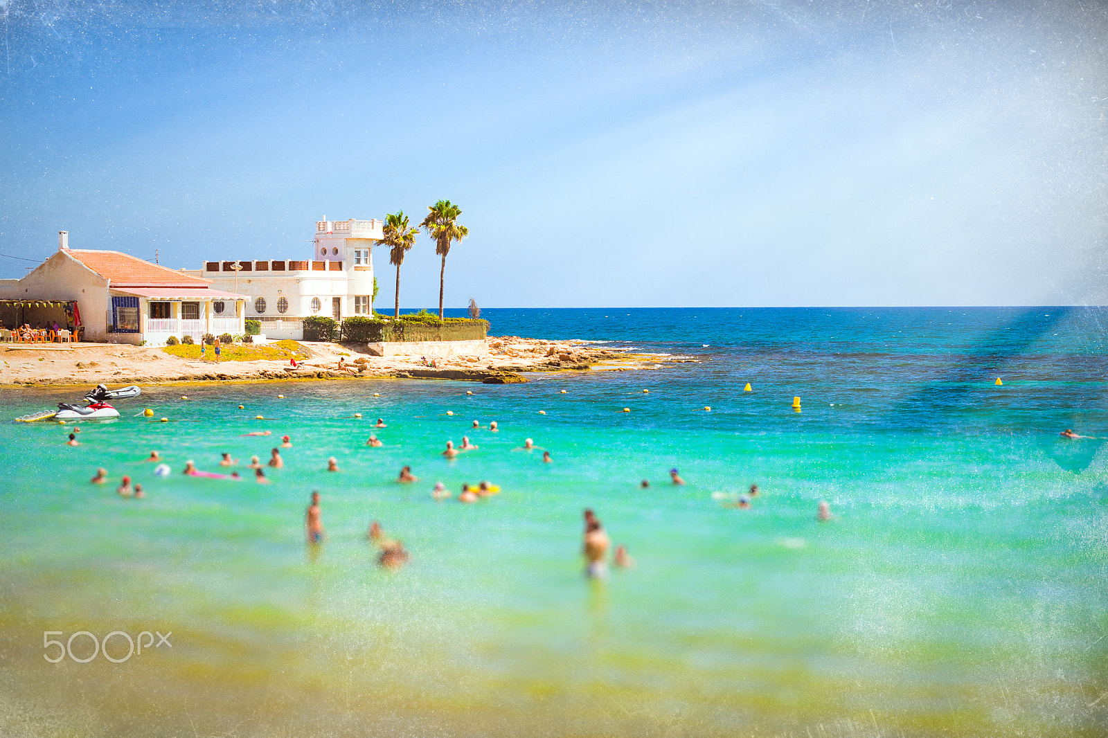 Nikon D3100 + Sigma 50mm F1.4 EX DG HSM sample photo. Abstract front-blurred background. sunny mediterranean beach, to photography