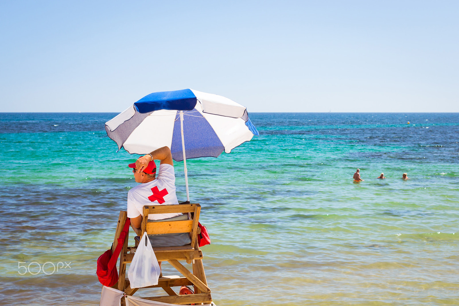 Nikon D3100 + Sigma 50mm F1.4 EX DG HSM sample photo. Sunny mediterranean beach, lifeguard sitting in observation post photography