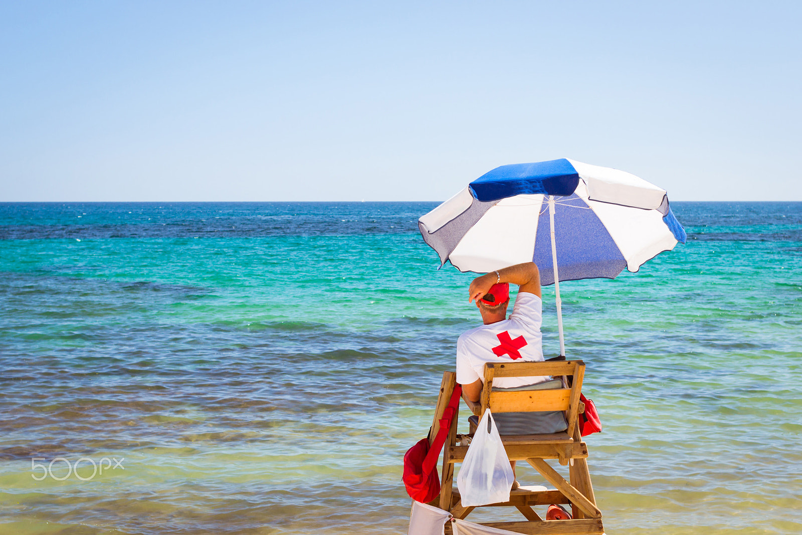 Nikon D3100 + Sigma 50mm F1.4 EX DG HSM sample photo. Sunny mediterranean beach, lifeguard sitting in observation post photography