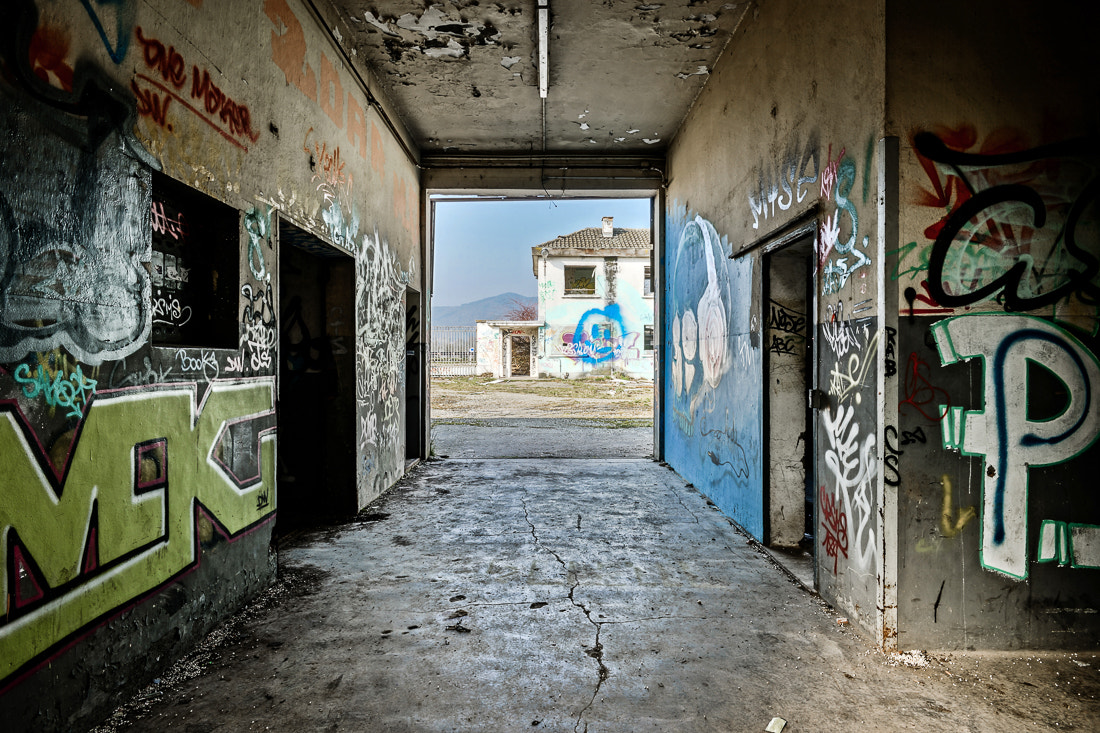 Sony a99 II + 20mm F2.8 sample photo. Old abandoned plant with graffity on walls photography